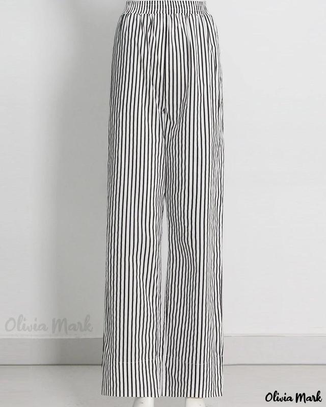 Olivia Mark – Chic Black and White Striped Off-shoulder Blouse and High-waisted Straight-leg Pants Set Product Image