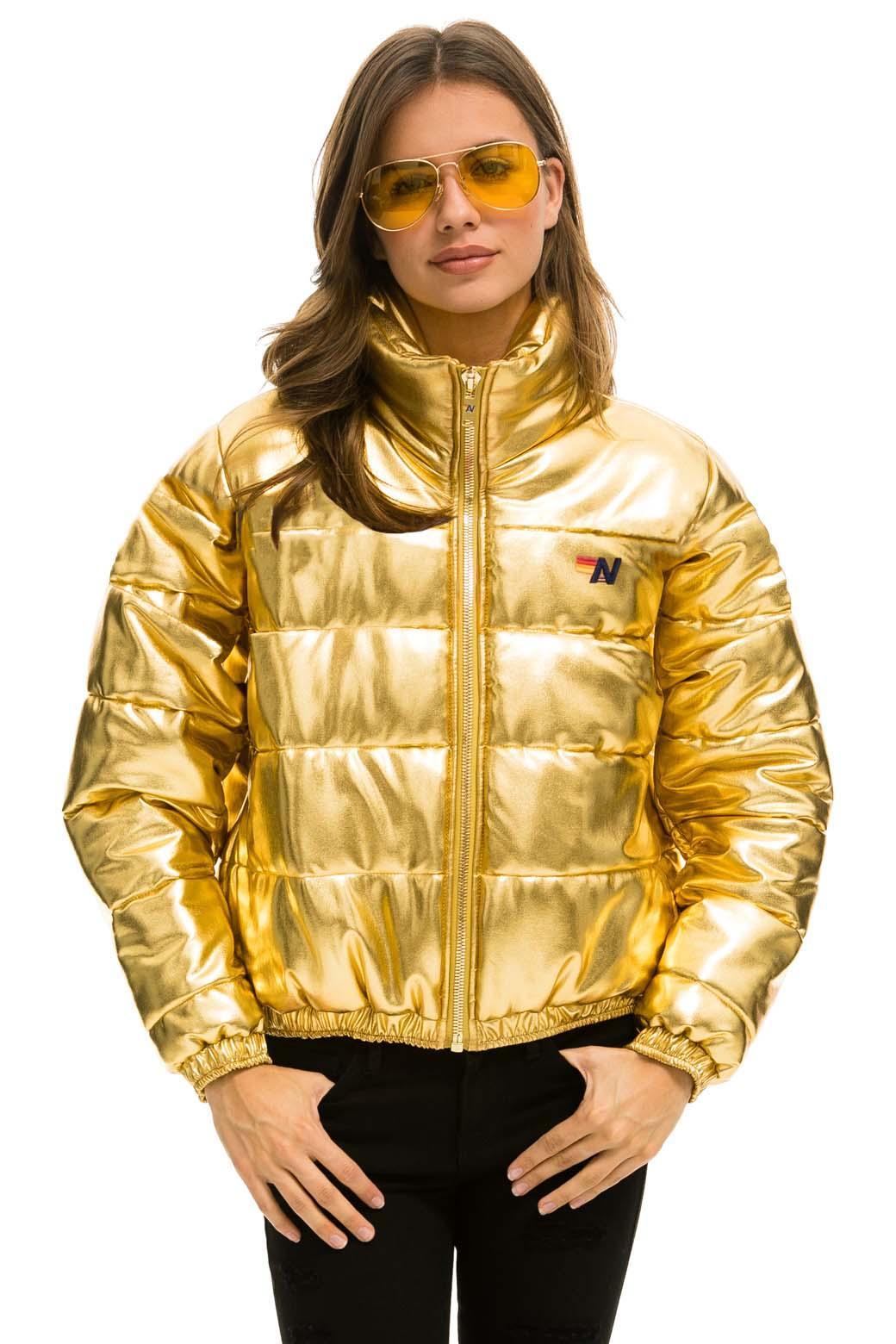 SUNBURST APRES PUFFER JACKET - GLOSSY GOLD Female Product Image