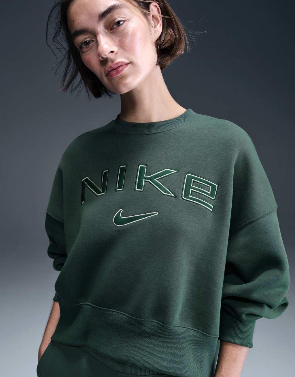 Nike Phoenix Fleece over-oversized logo sweatshirt in dark green Product Image