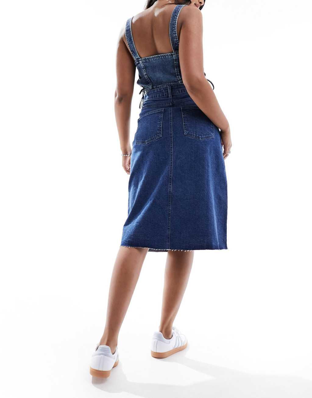 Urban Bliss y2k seam detail raw edge knee length skirt in mid wash blue Product Image