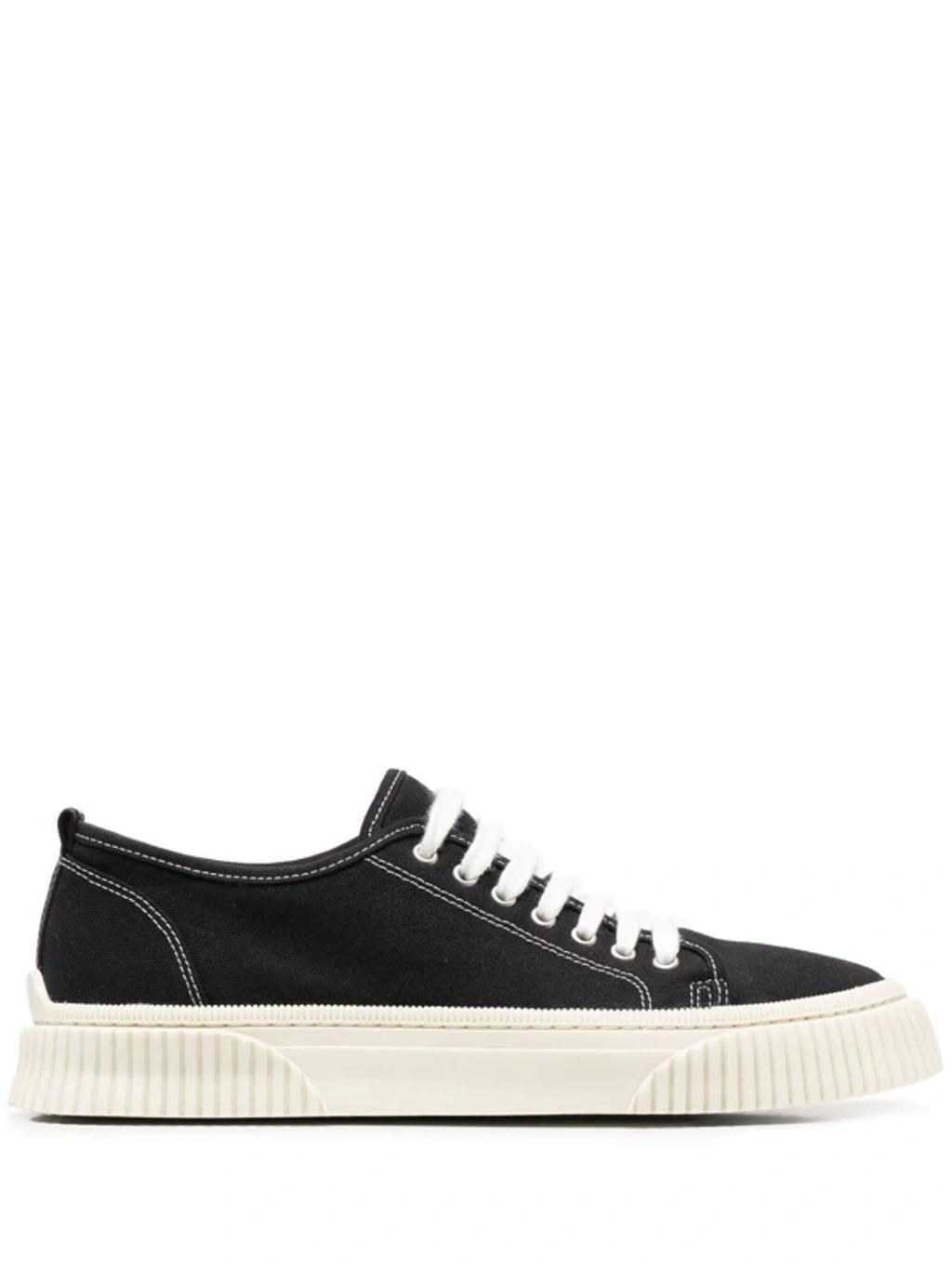 Low-top Textured Sole Sneakers In Black Product Image