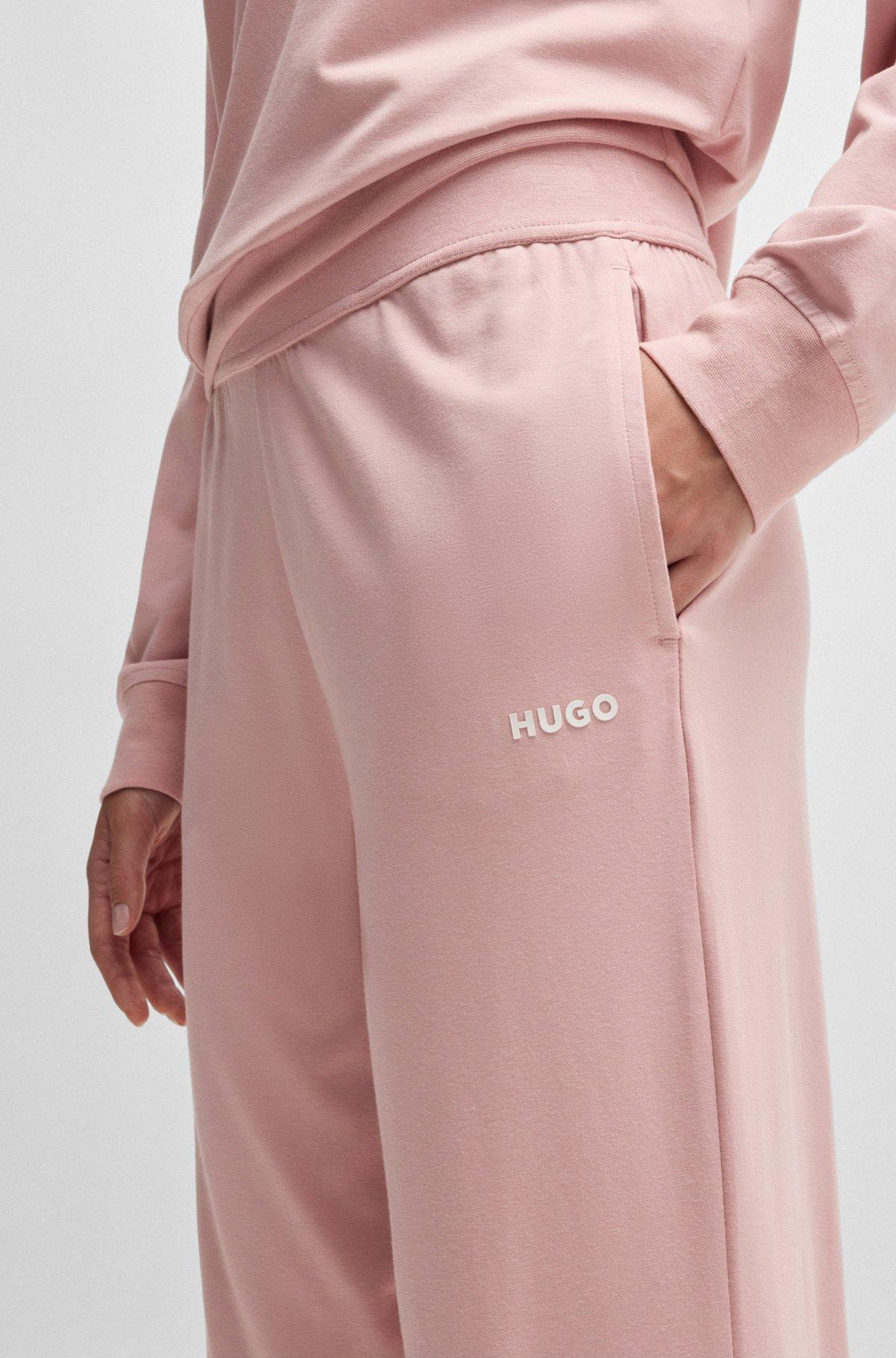 Relaxed-fit tracksuit bottoms with printed logo Product Image