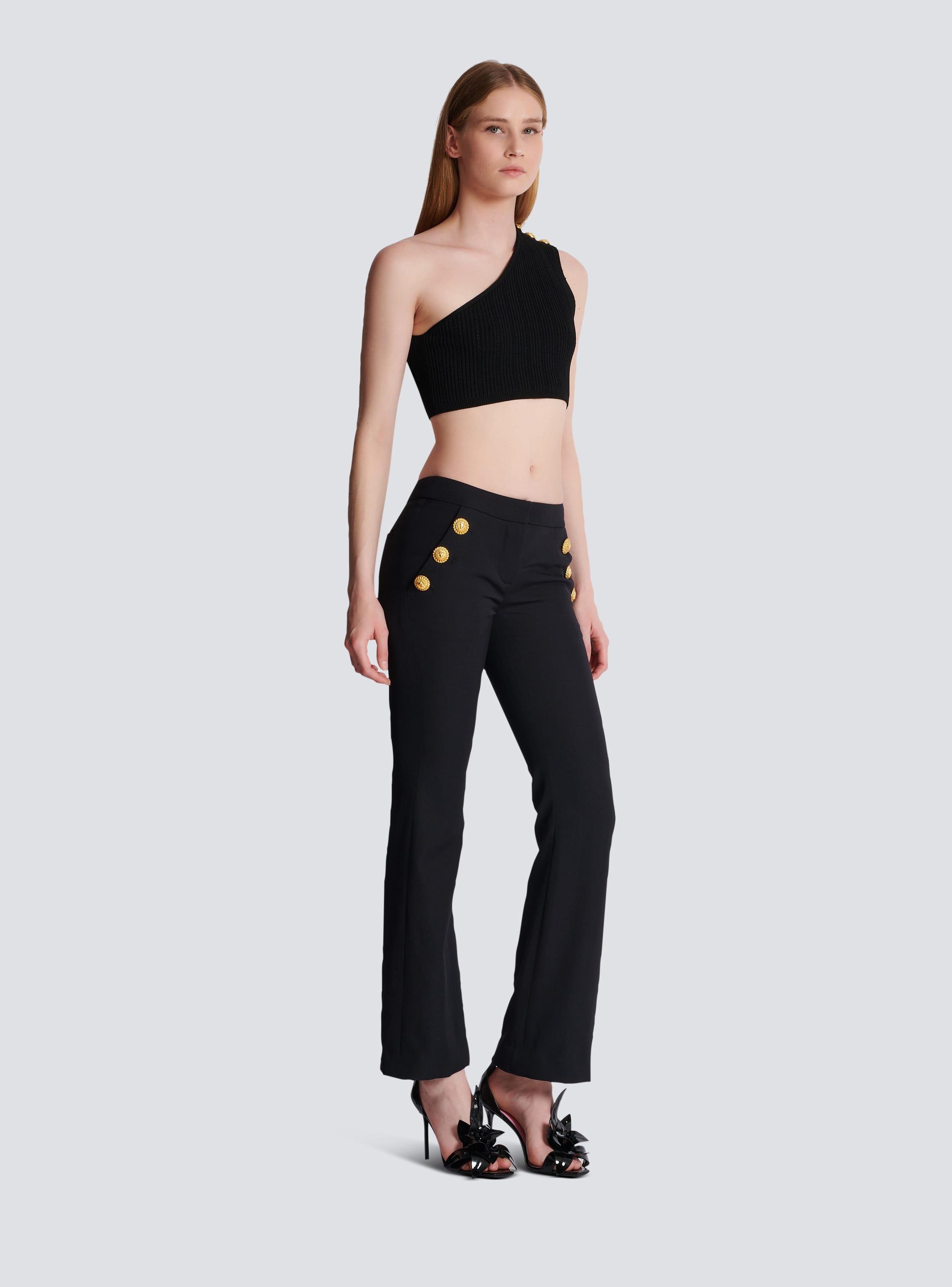 Flared trousers with buttons Product Image