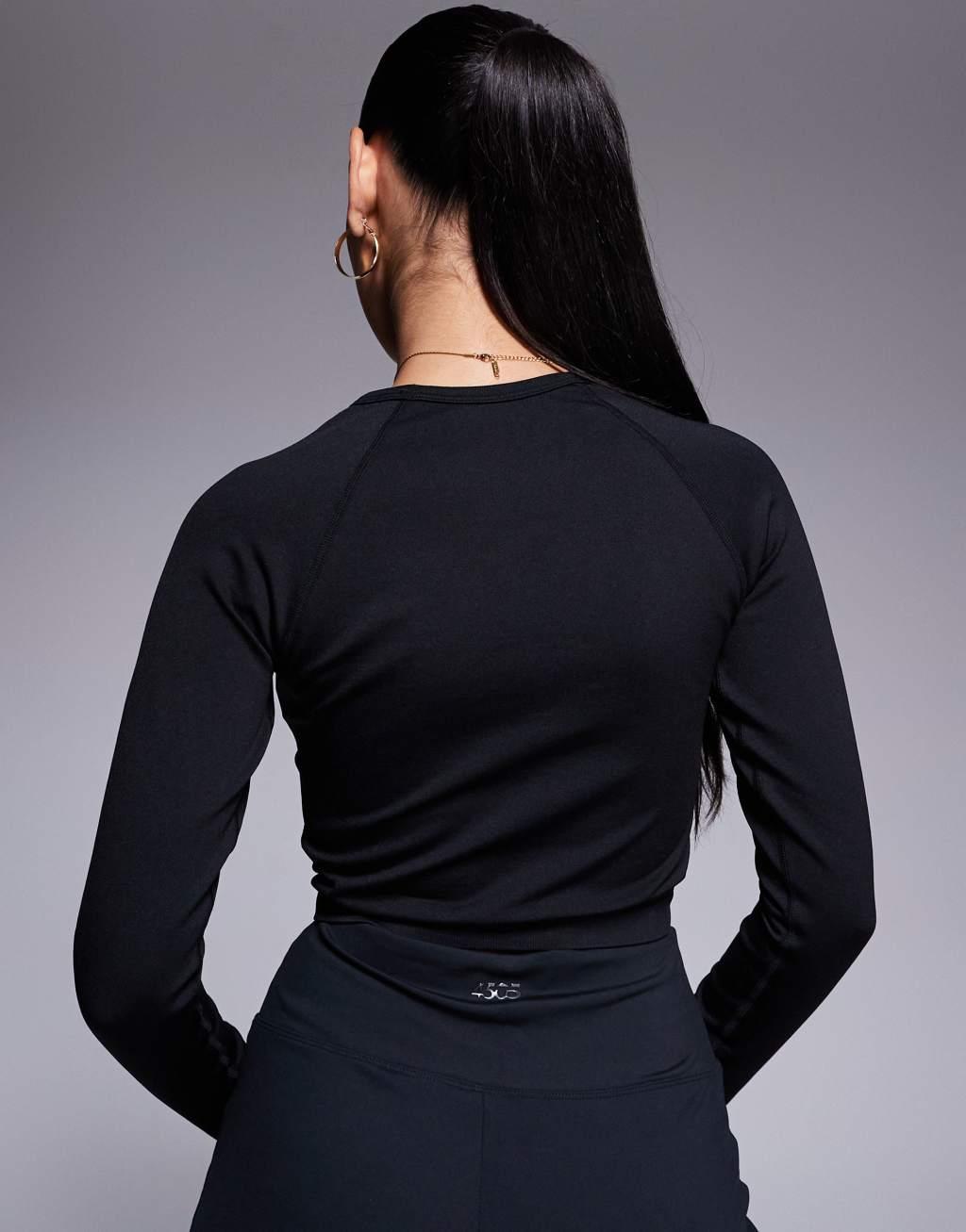 ASOS 4505 seamless cropped long sleeve top in black Product Image