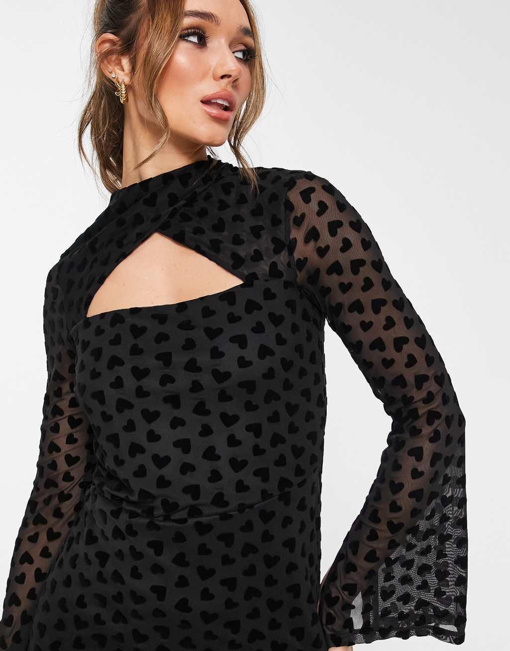 River Island heart mesh cut out mini dress in black devore Product Image