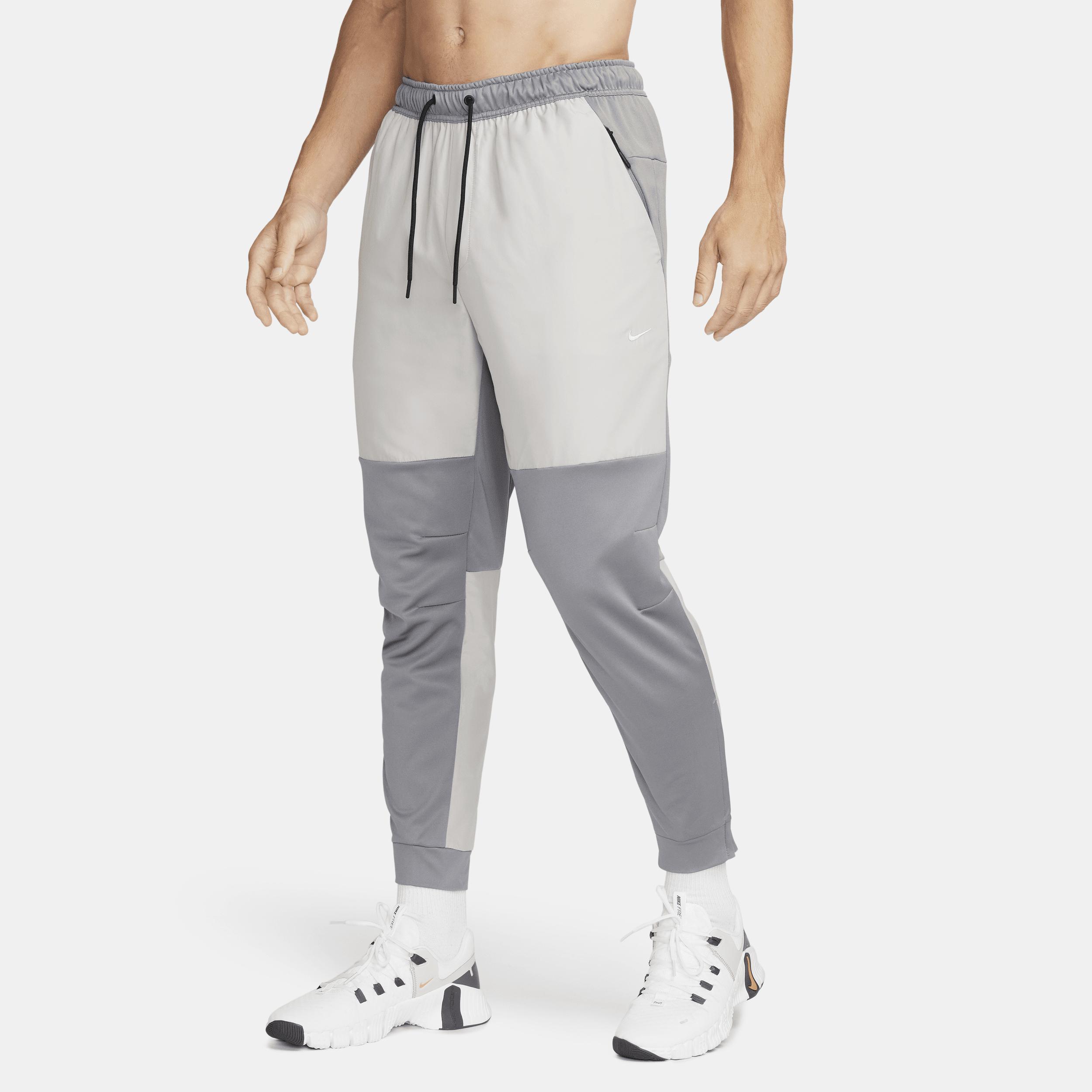 Nike Mens Unlimited Water-Repellent Tapered Versatile Pants Product Image