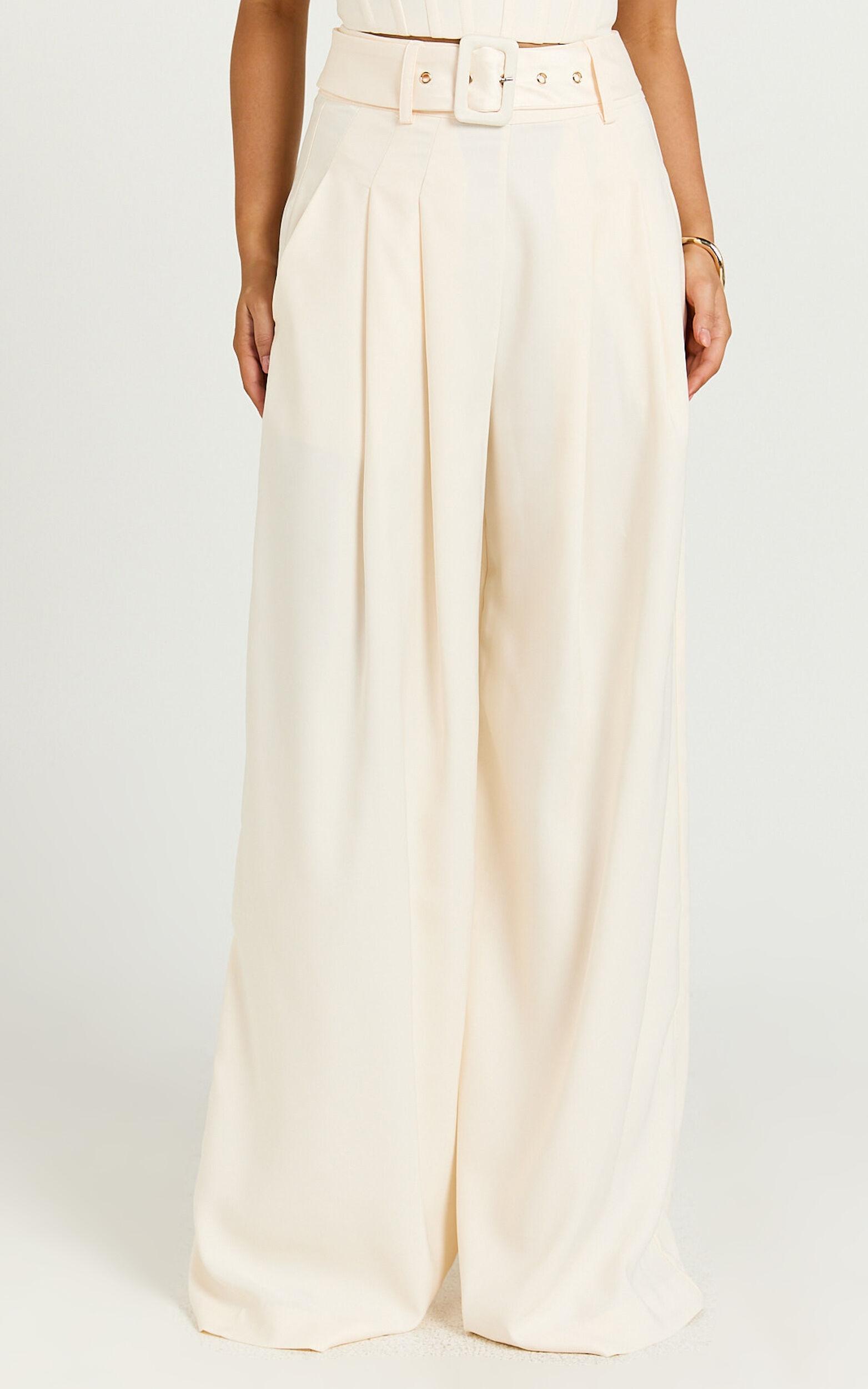 Amalie The Label - Raquelle Pleated Wid Leg Belted Pant in Ivory Product Image