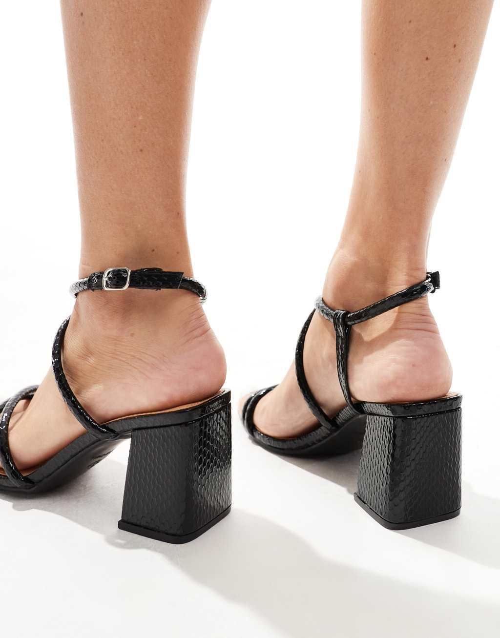 SEQWL Wide Fit mid block heel sandals in black snake Product Image