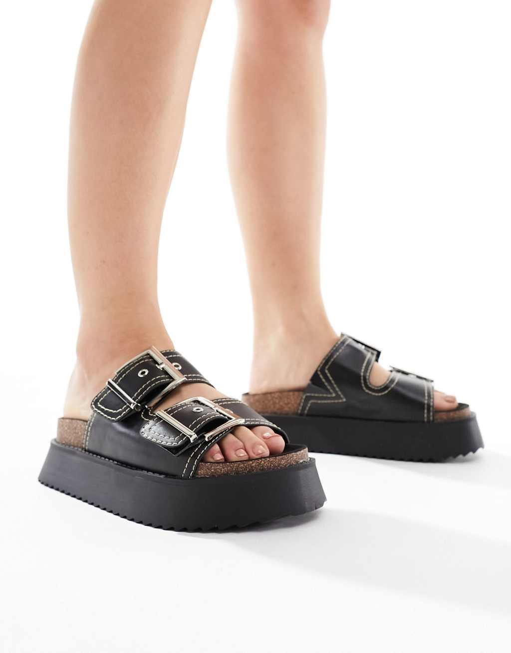 ASOS DESIGN Wide Fit Firecracker double strap footbed flat sandals in black Product Image