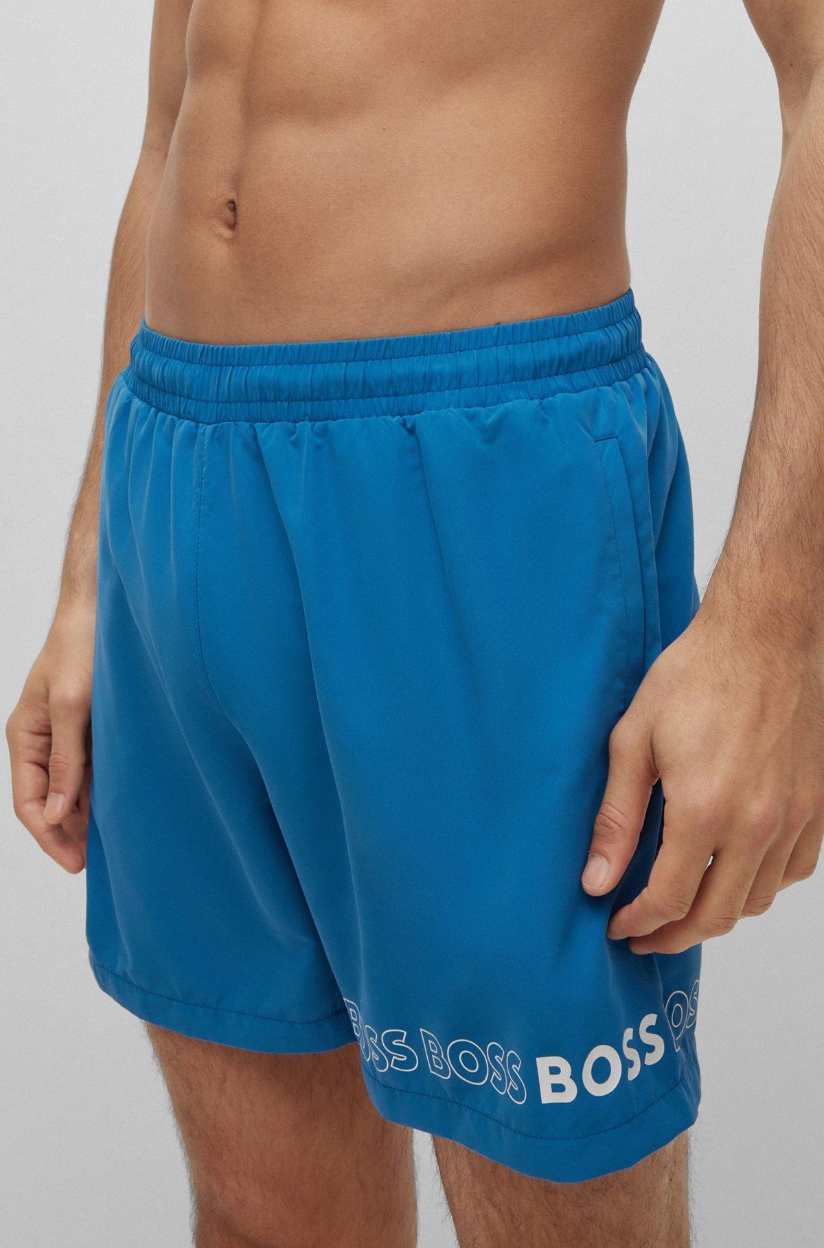 Swim shorts with repeat logos Product Image