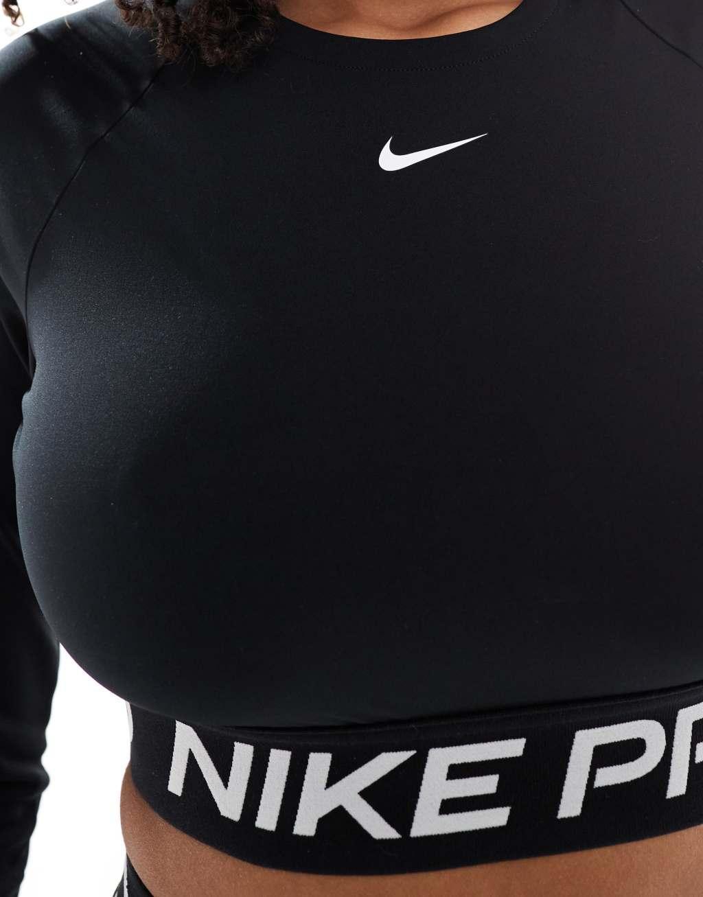 Nike Training Pro 365 cropped long sleeve top in black Product Image