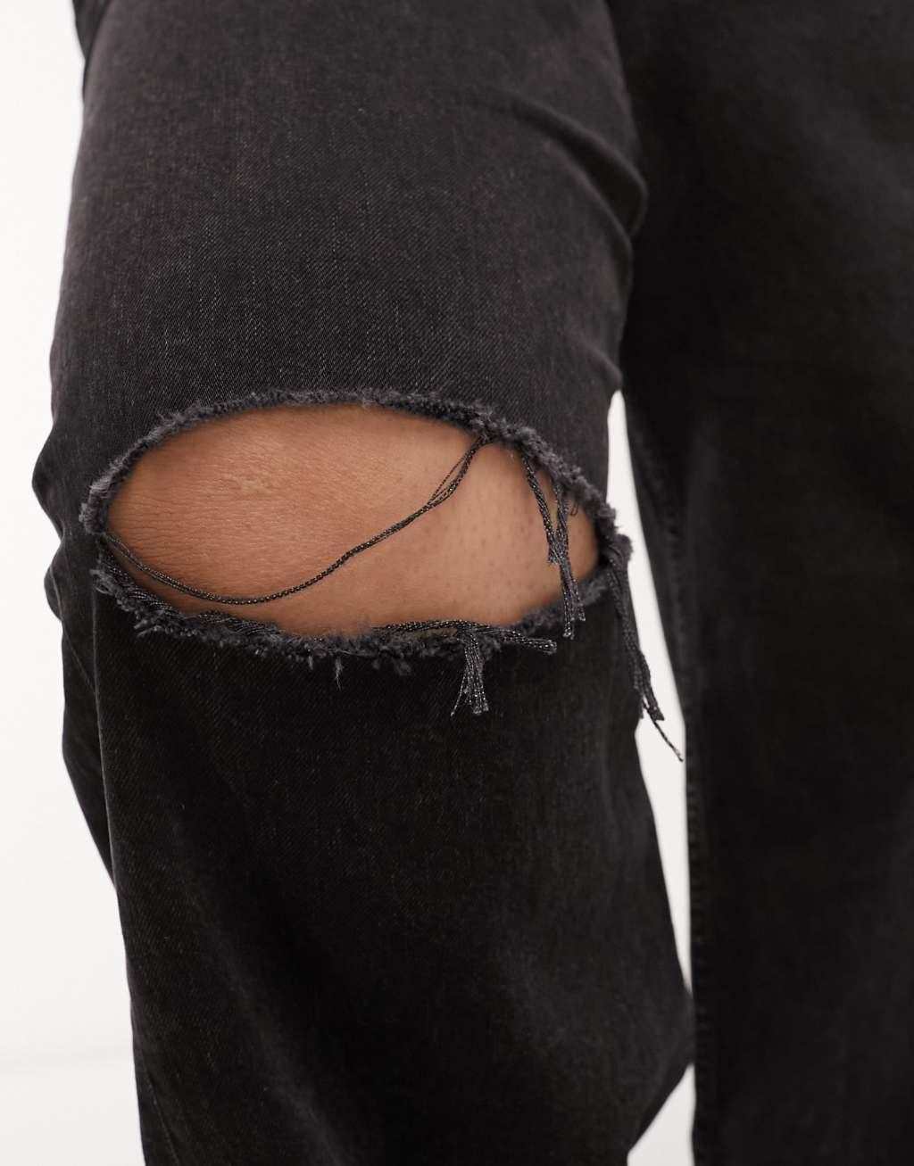 ASOS DESIGN Curve mid rise baggy boyfriend jeans in washed black with knee rips Product Image