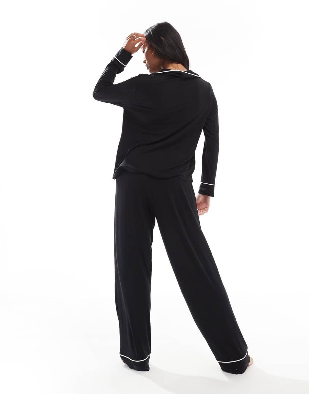 ASOS DESIGN Petite super soft long sleeve shirt & pants pajama set with contrast piping in black Product Image