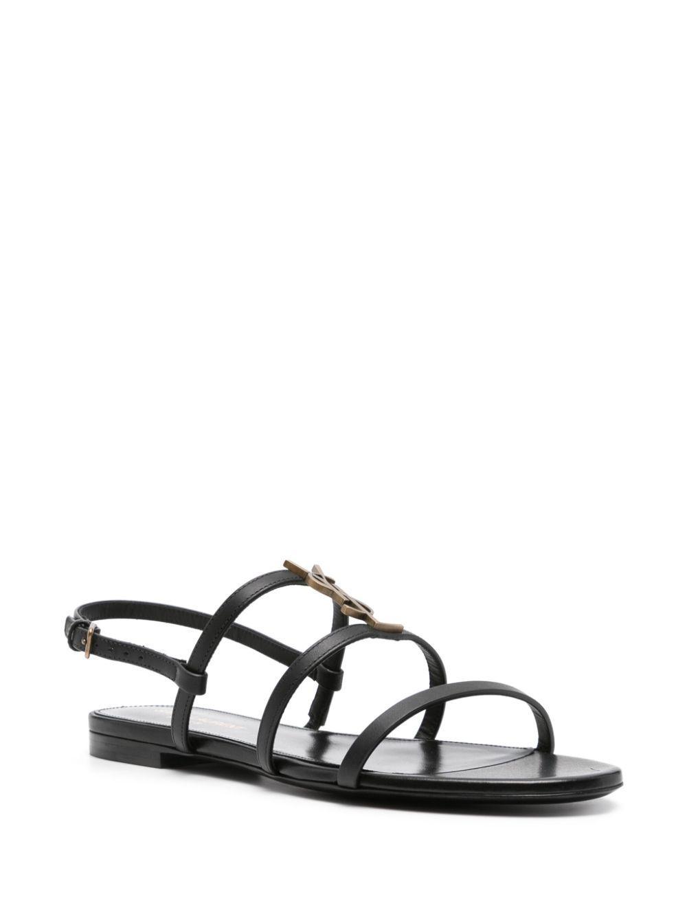 SAINT LAURENT Women's Cassandre Plaque Sandals In Black Product Image