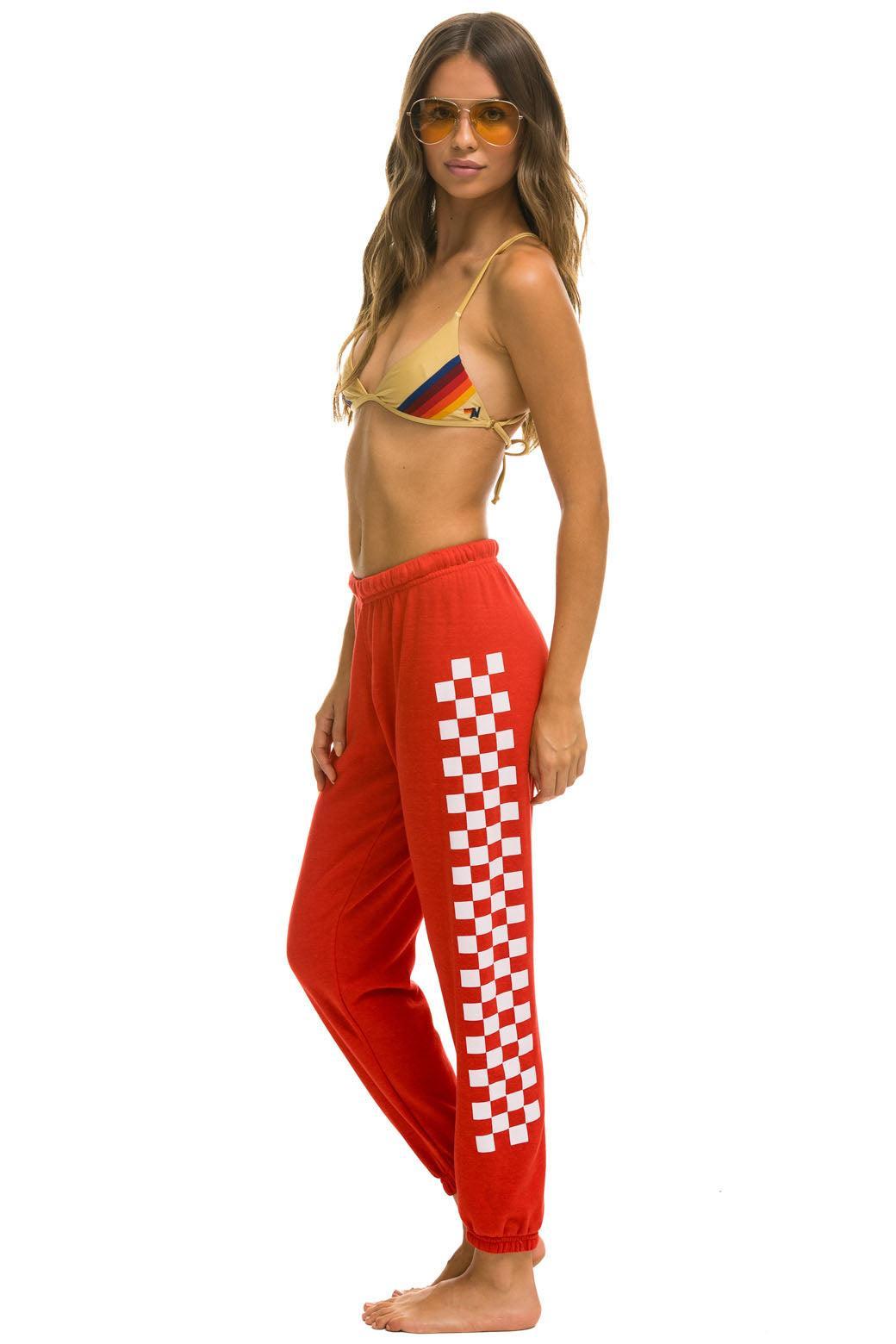 CHECK LEG SWEATPANTS - RED // WHITE Female Product Image