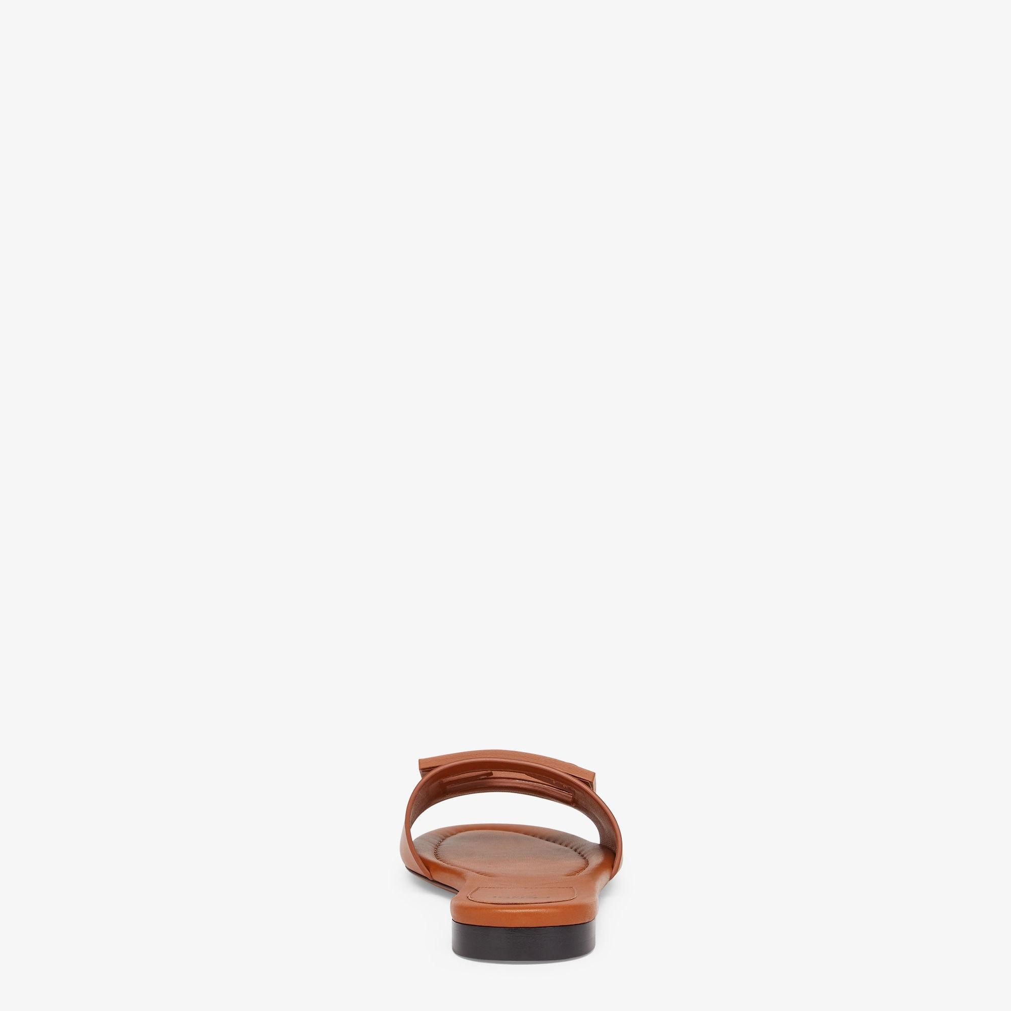 BaguetteBrown leather slides Product Image