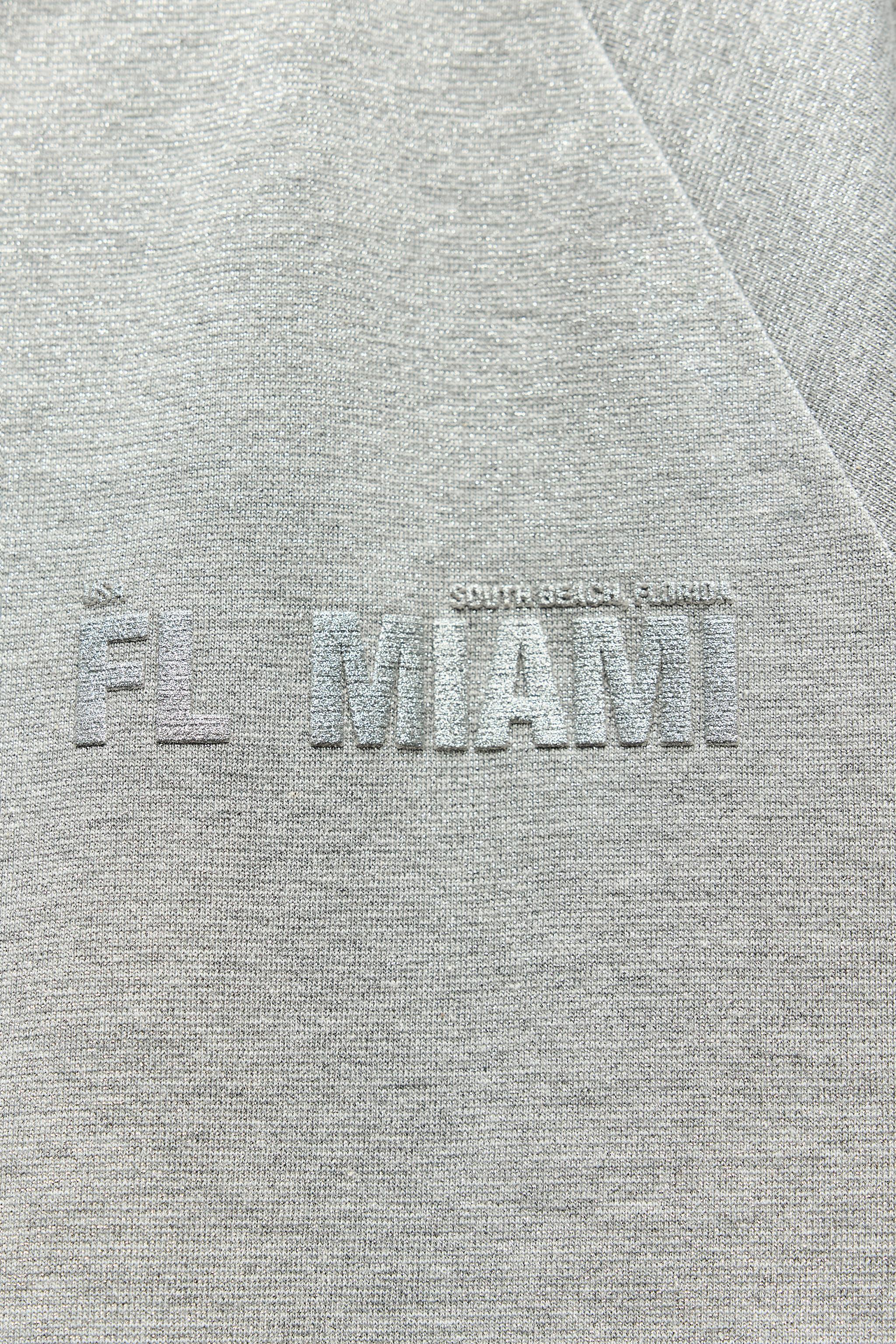 METALLIC THREAD TEXT CROP TOP Product Image