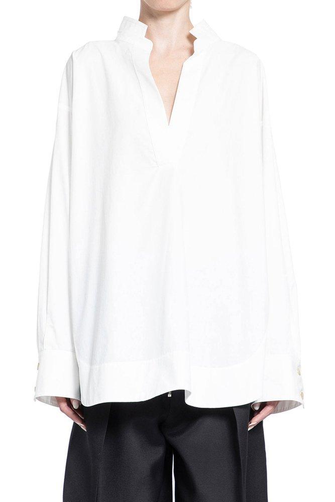 The Tito Curved Hem Top In White Product Image