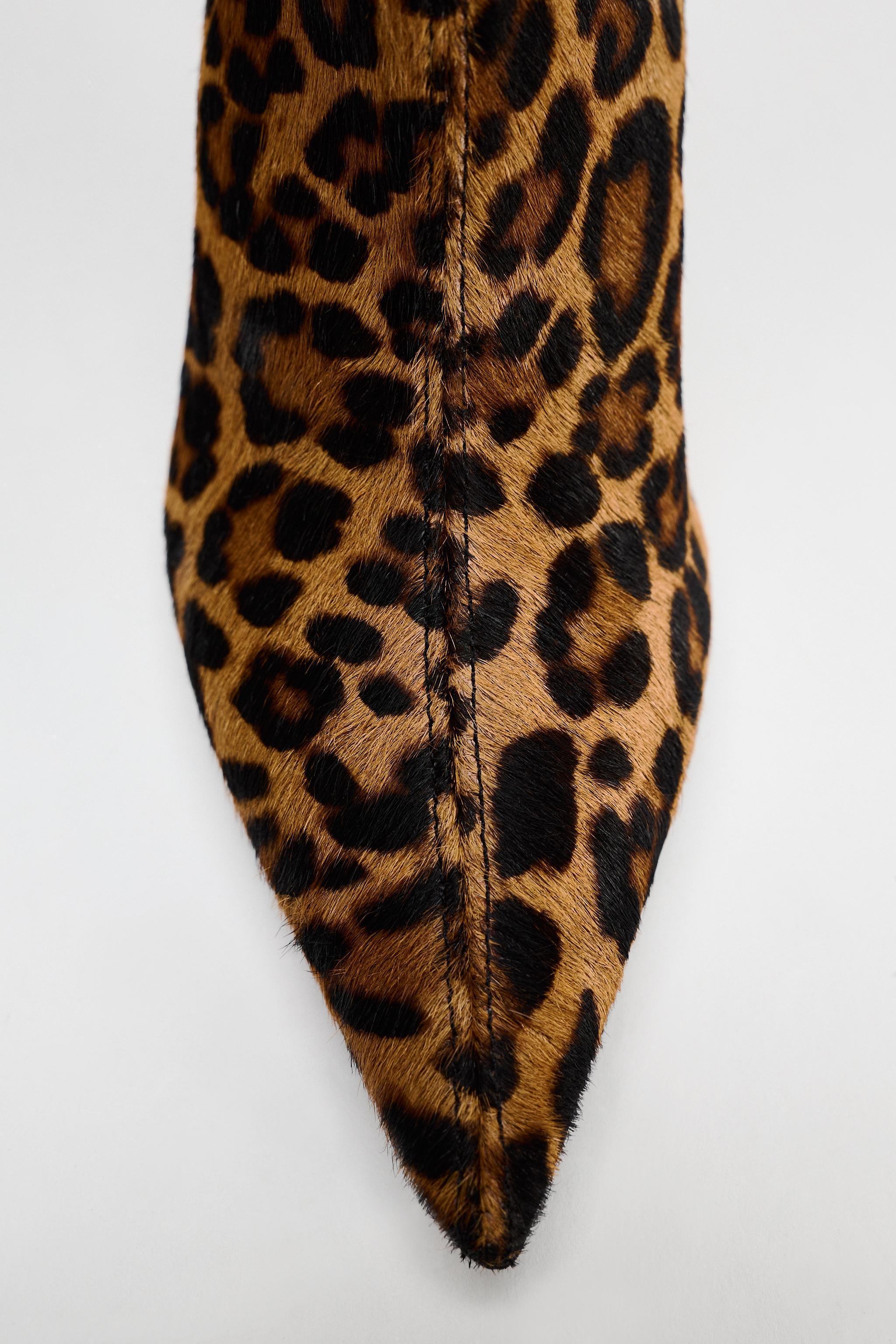 ANIMAL PRINT HEELED LEATHER BOOTS Product Image