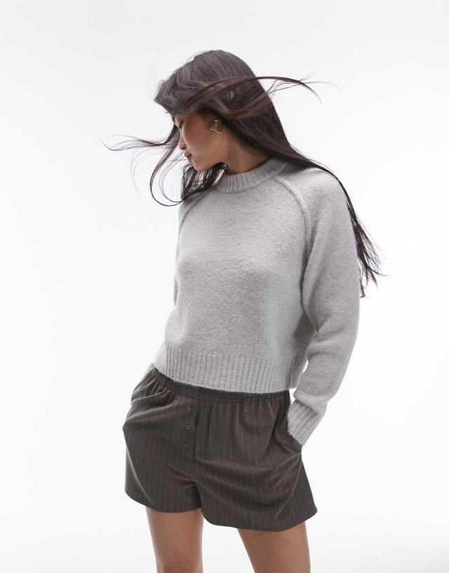 Topshop knit crew with raglan and exposed seam sweater in light gray Product Image