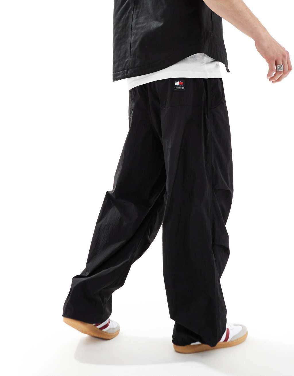 Tommy Jeans nylon parachute pants in black Product Image