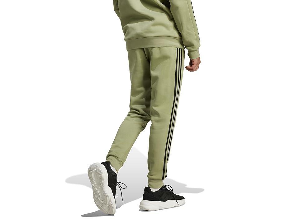 adidas Essentials Fleece 3-Stripes Tapered Cuff Pants (Tent Green) Men's Clothing Product Image