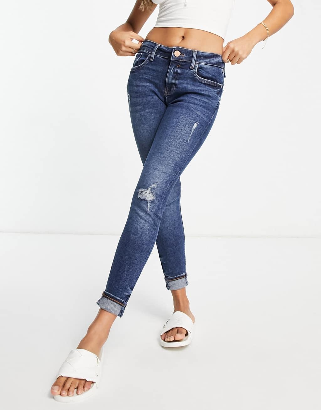 River Island mid rise turnup skinny jeans in mid blue product image