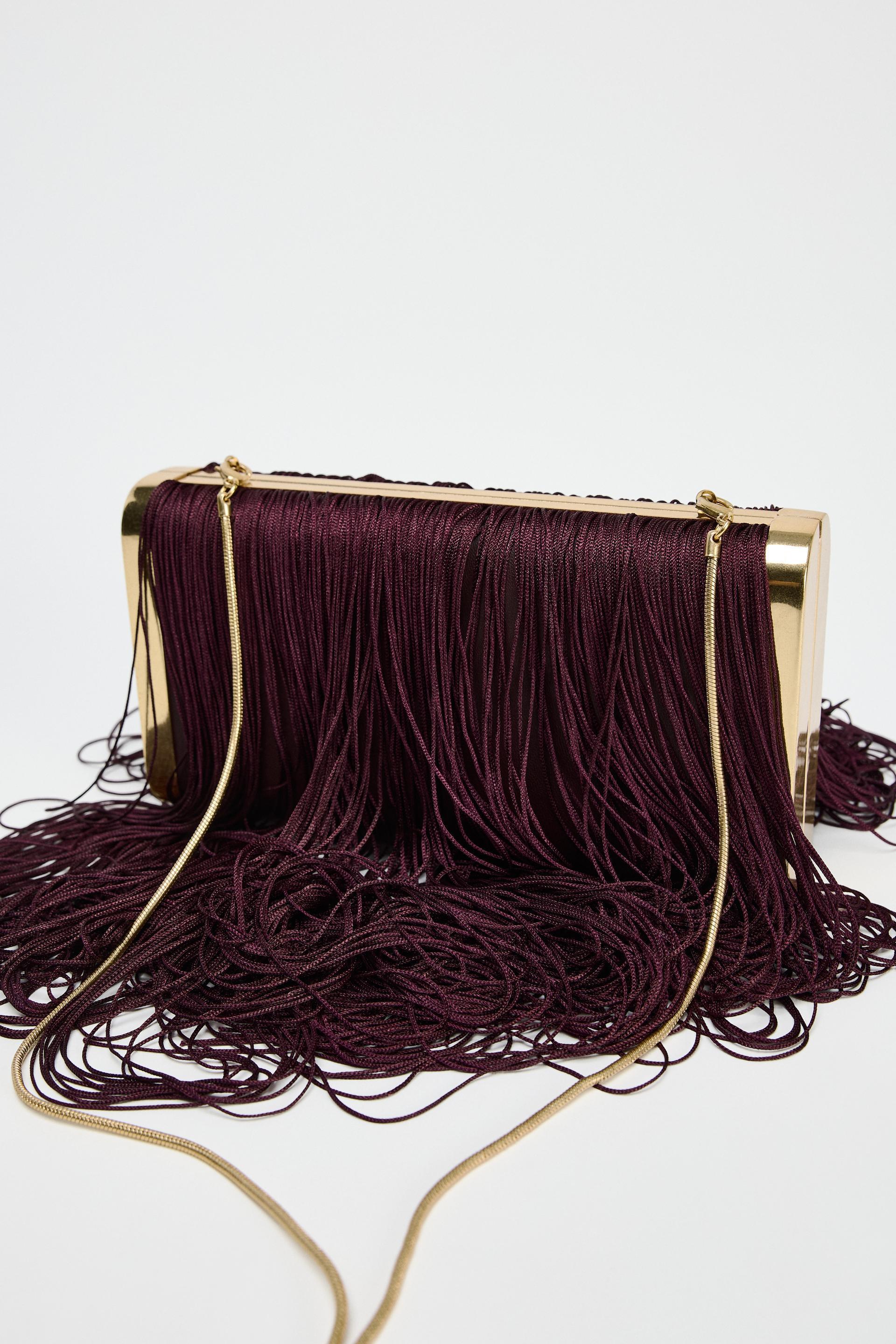 FRINGE CLUTCH Product Image