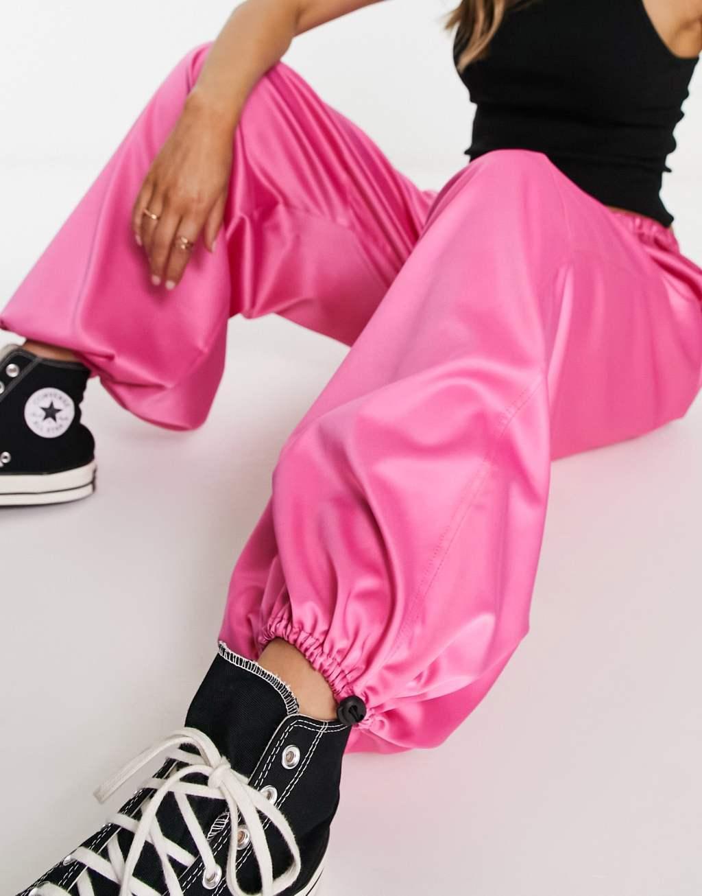 ASOS DESIGN satin parachute pants in pink Product Image