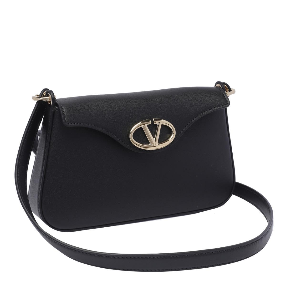 Valentino Logo Plaque Foldover Top Shoulder Bag In Black Product Image