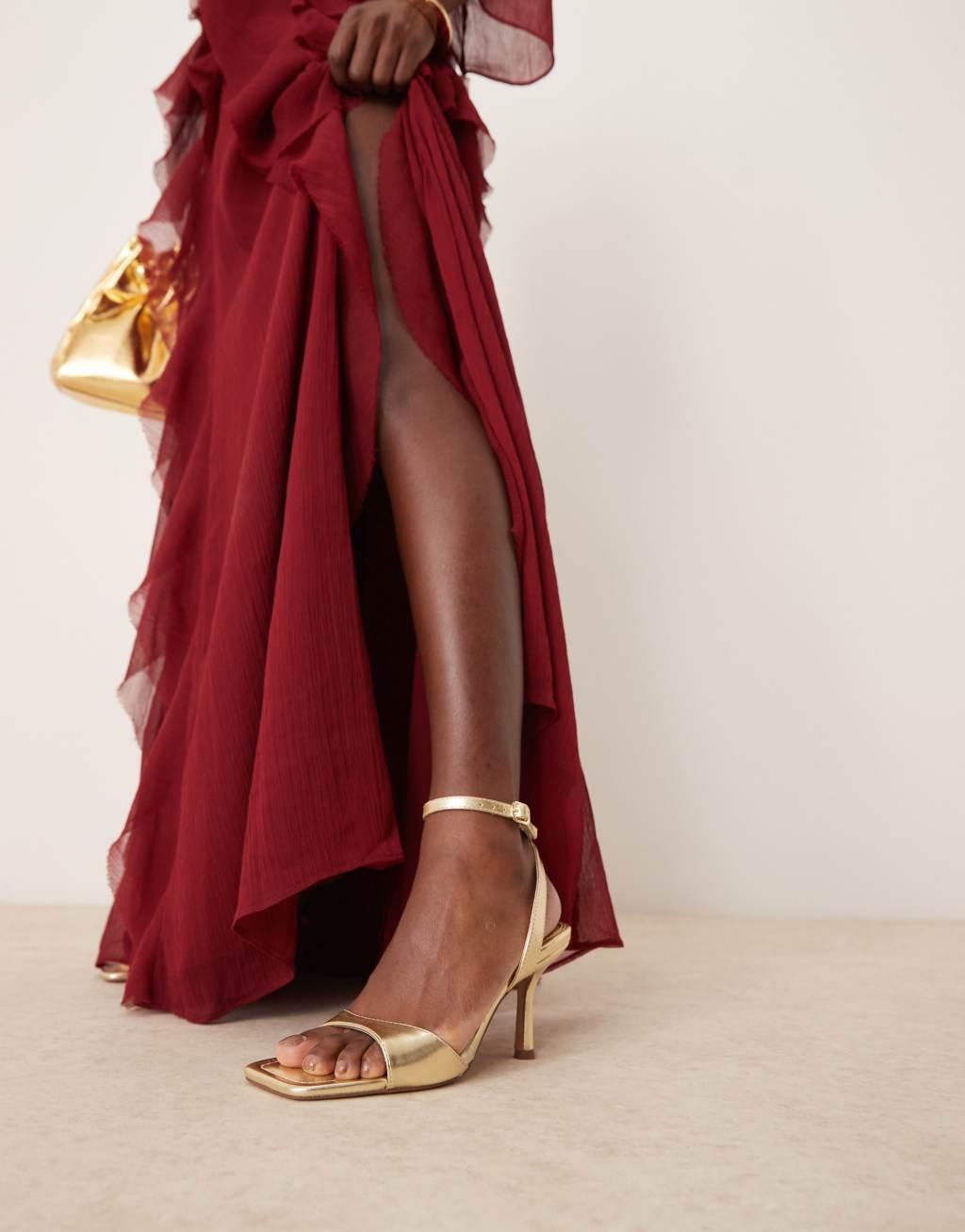 ASOS DESIGN Hollow barely there heeled sandals in gold Product Image