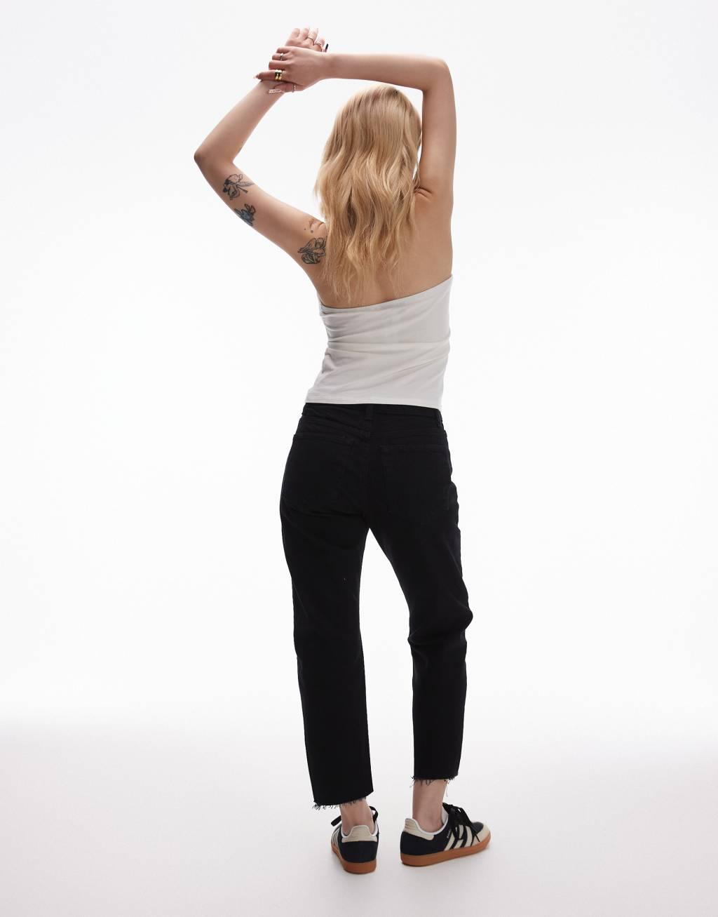 Topshop Petite cropped mid rise straight jeans with raw hems in black Product Image