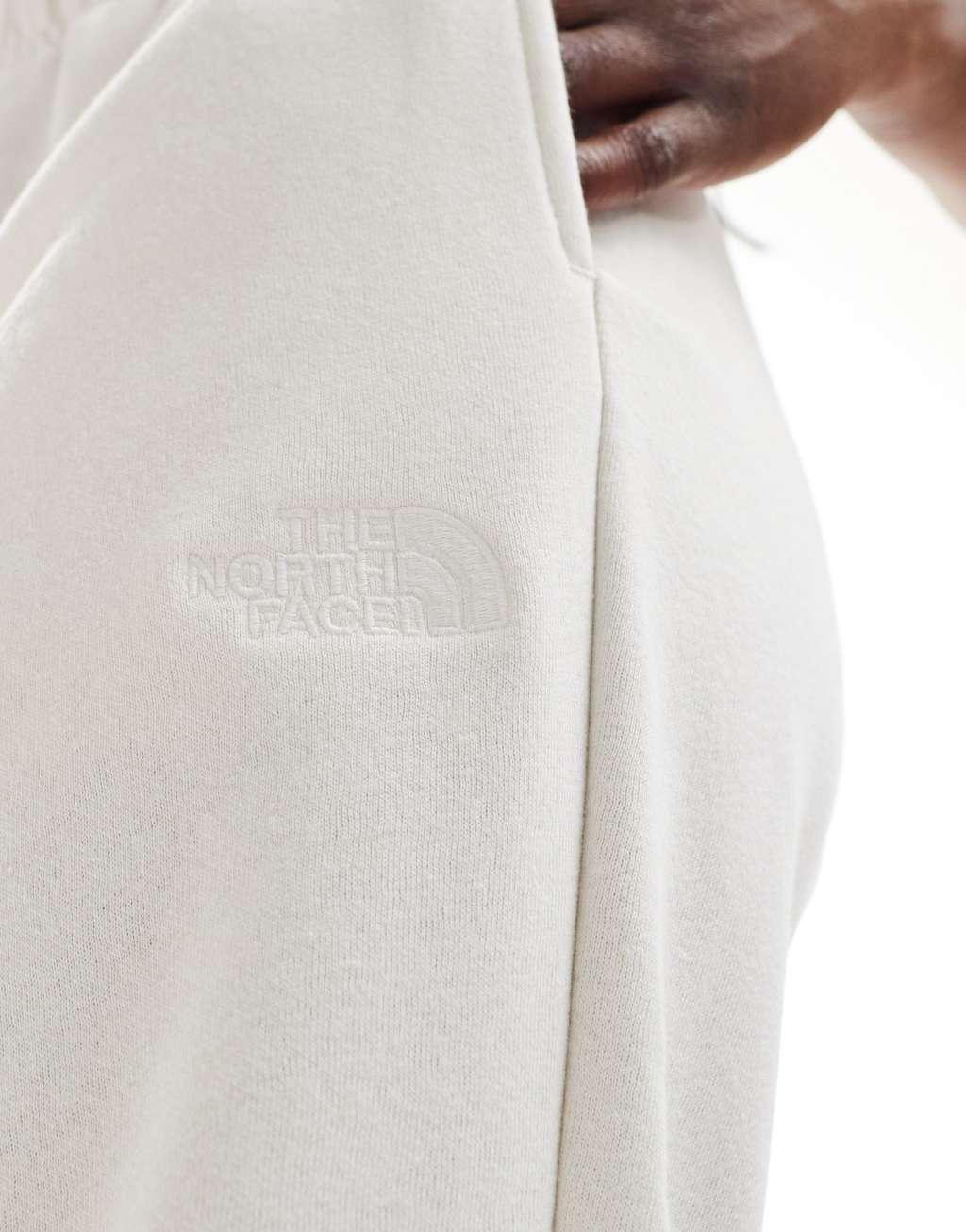 The North Face Evolution Cocoon track pants in white Product Image