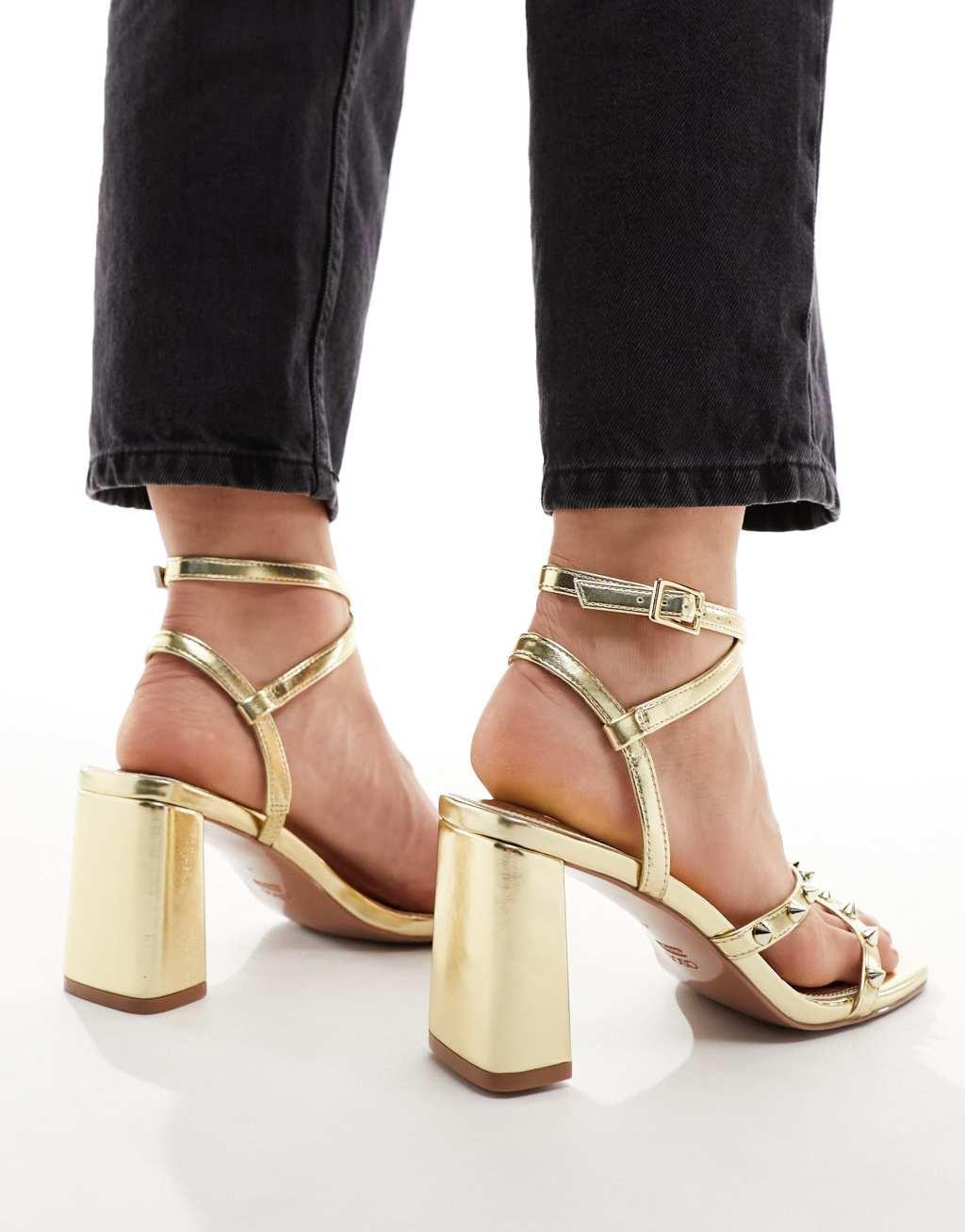 ASOS DESIGN Wide Fit Hampstead studded mid heeled sandals in gold Product Image