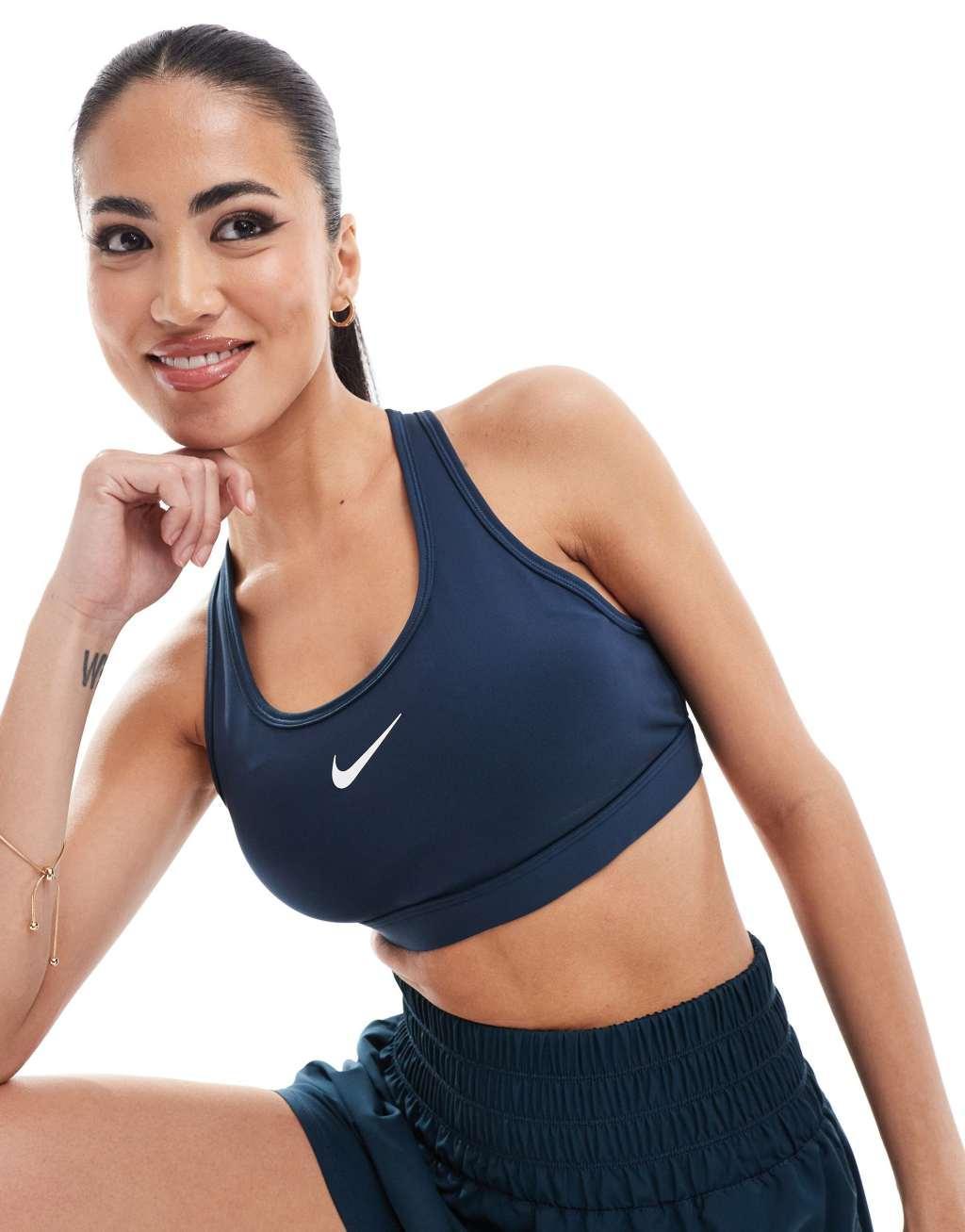 Nike Training Swoosh medium support sports bra in navy Product Image