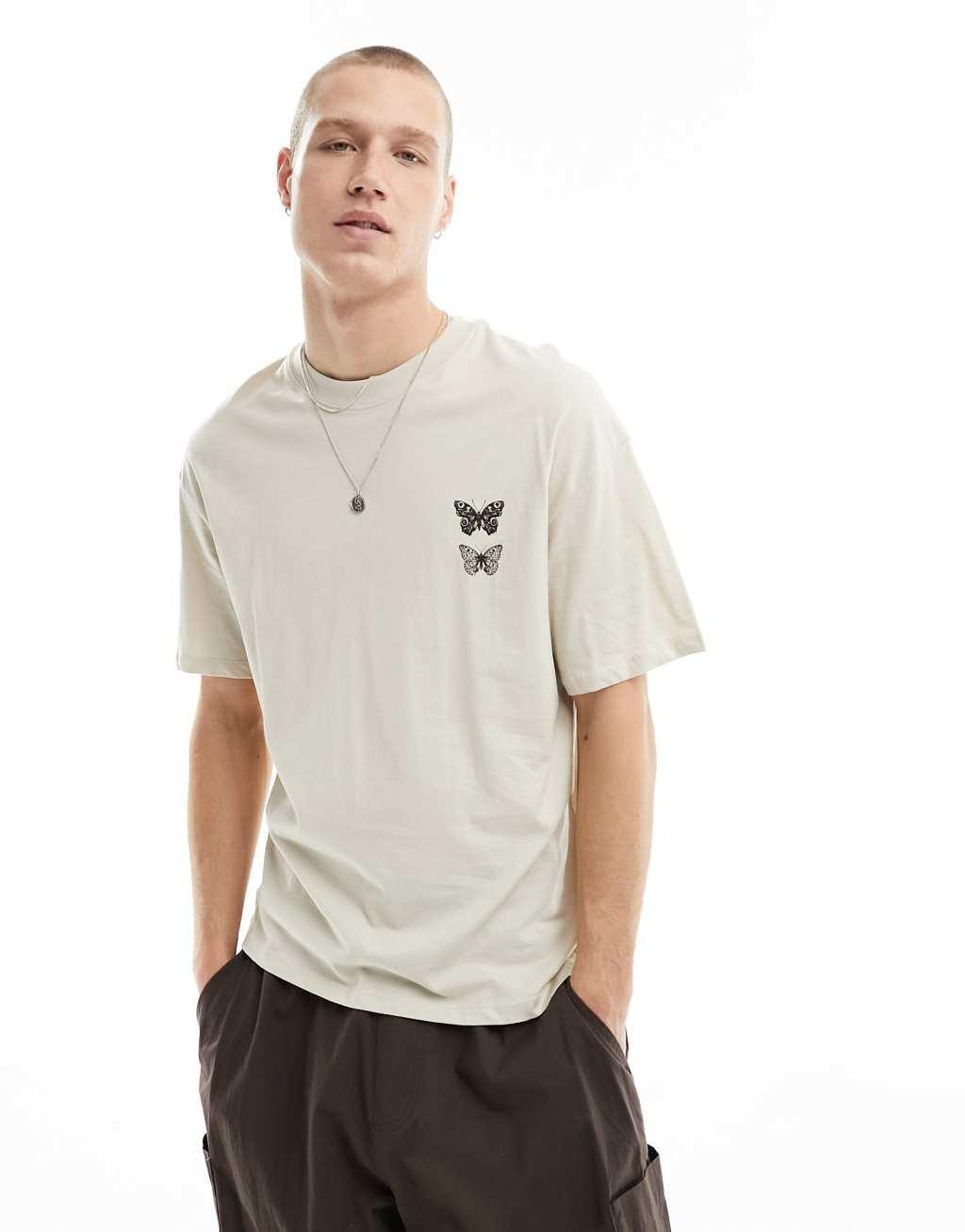 Jack & Jones oversized T-shirt with butterfly back print in beige Product Image