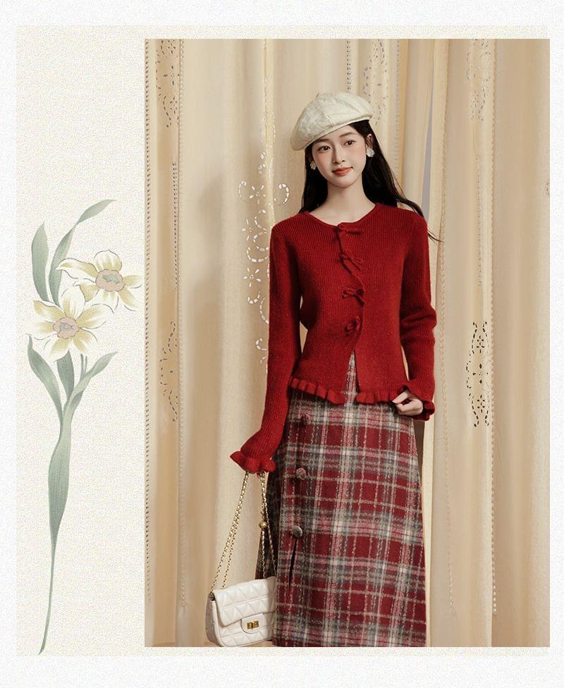 Set: Long-Sleeve Crew Neck Plain Bow Button Knit Top + High Waist Plaid Slit Midi A-Line Skirt Product Image