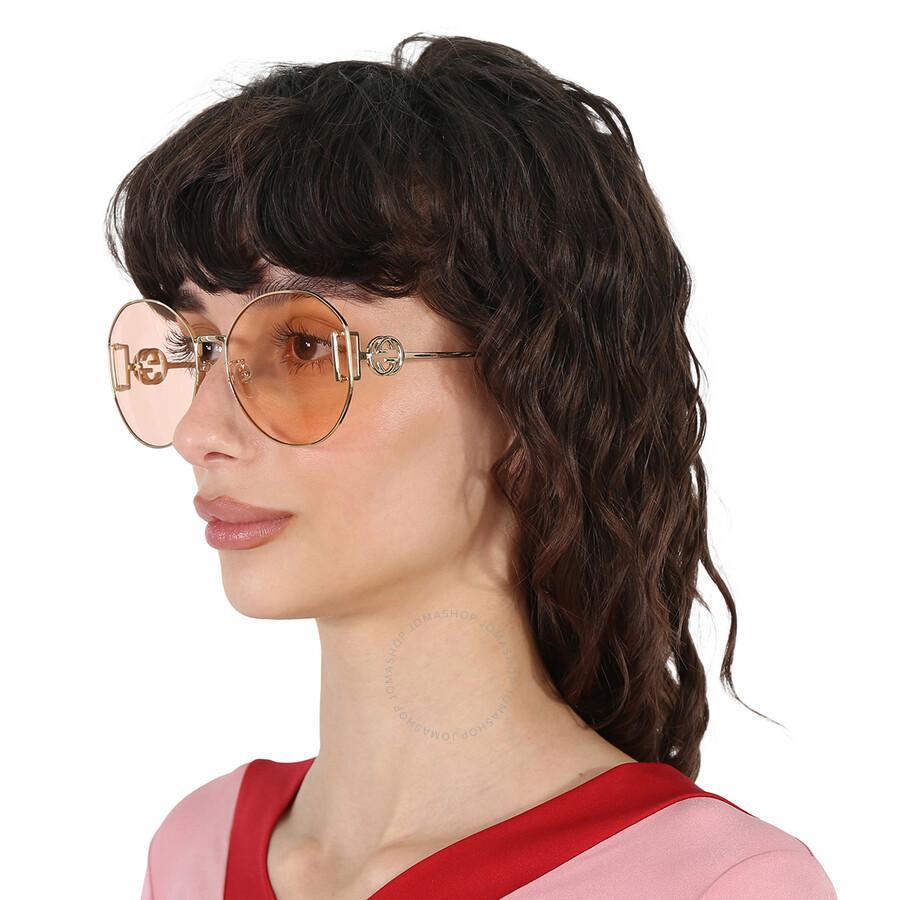 Pink Round Ladies Sunglasses Gg1206sa 004 63 In Gold / Ink / Pink Product Image