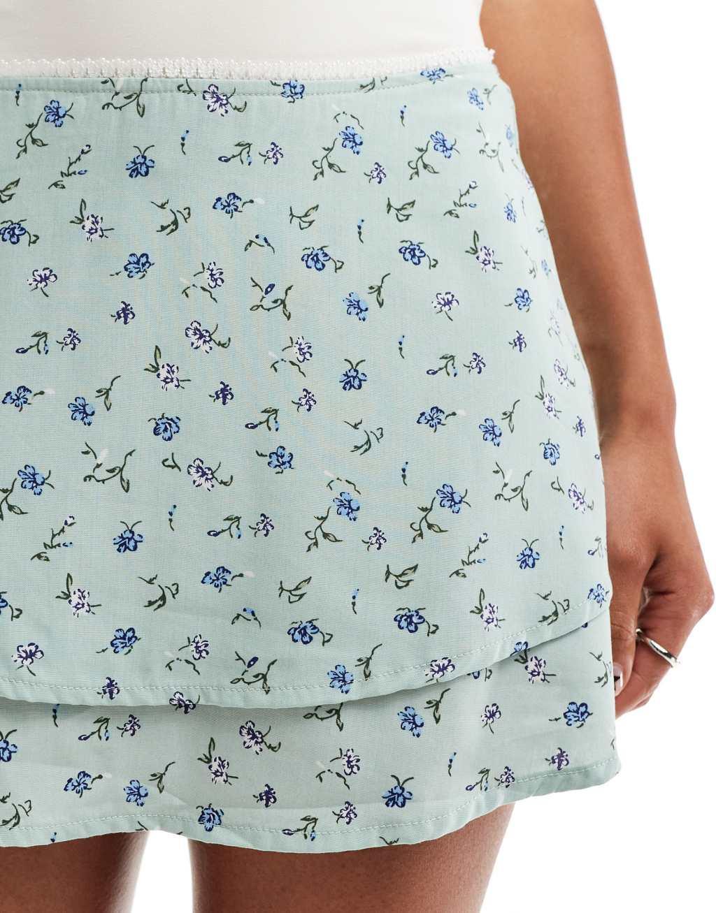 Motel Exclusive luiso tiered floral print mini skirt in pale blue Product Image