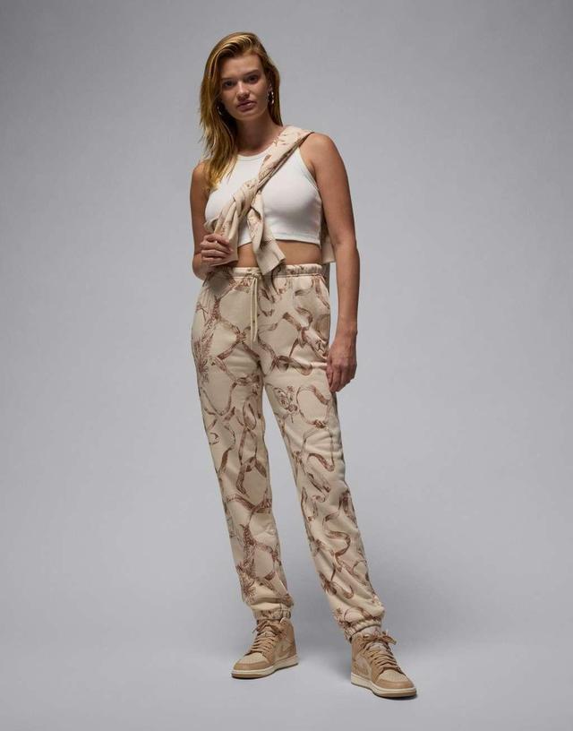 Jordan Brooklyn fleece all-over print sweatpants in brown Product Image