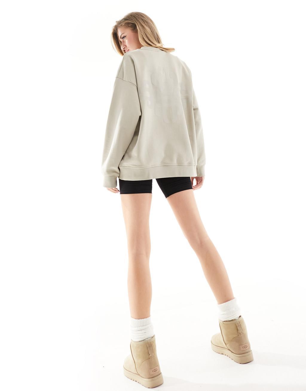 The Couture Club washed emblem sweatshirt in beige Product Image