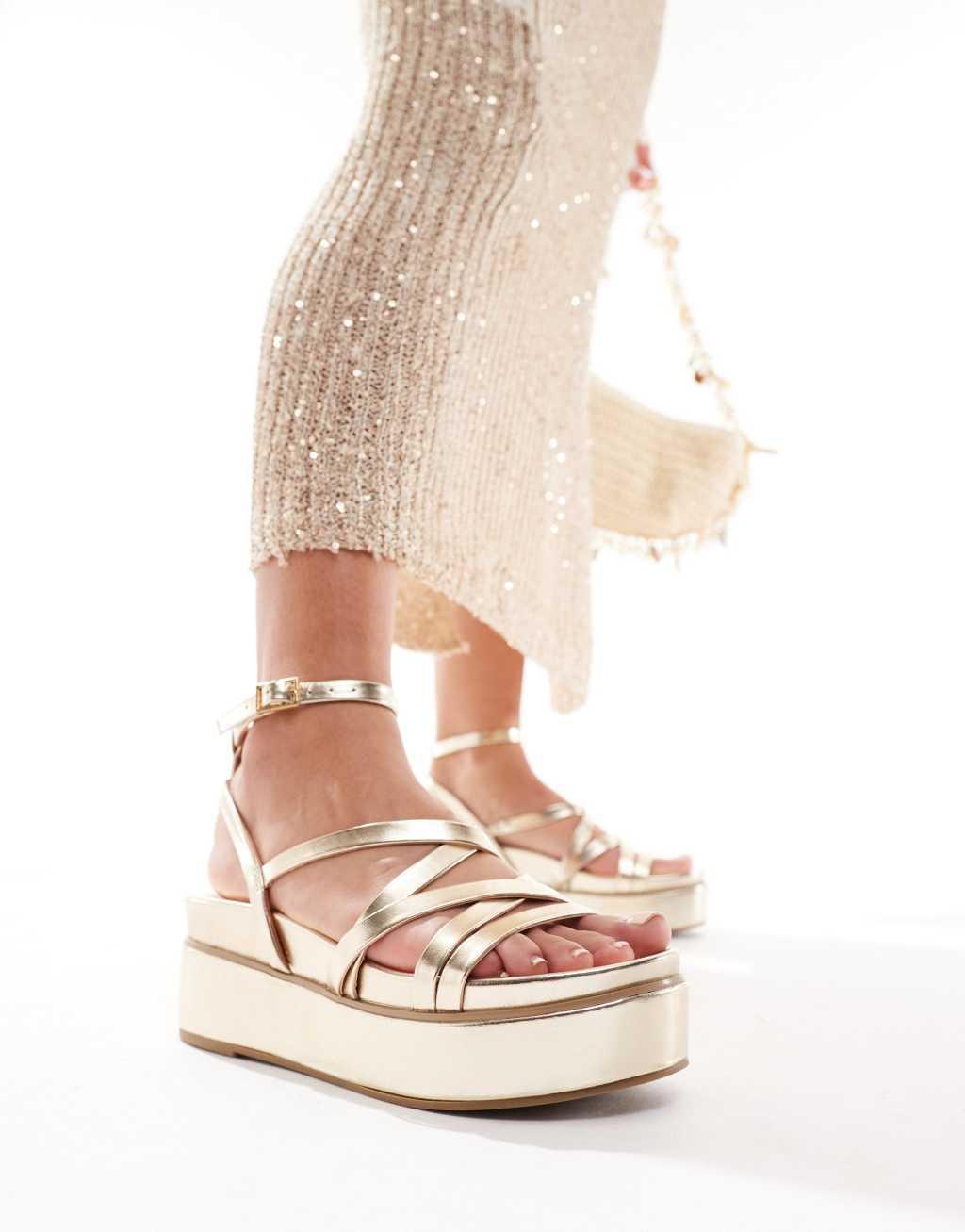 ASOS DESIGN Taurus 2 strappy flatform sandals in gold Product Image