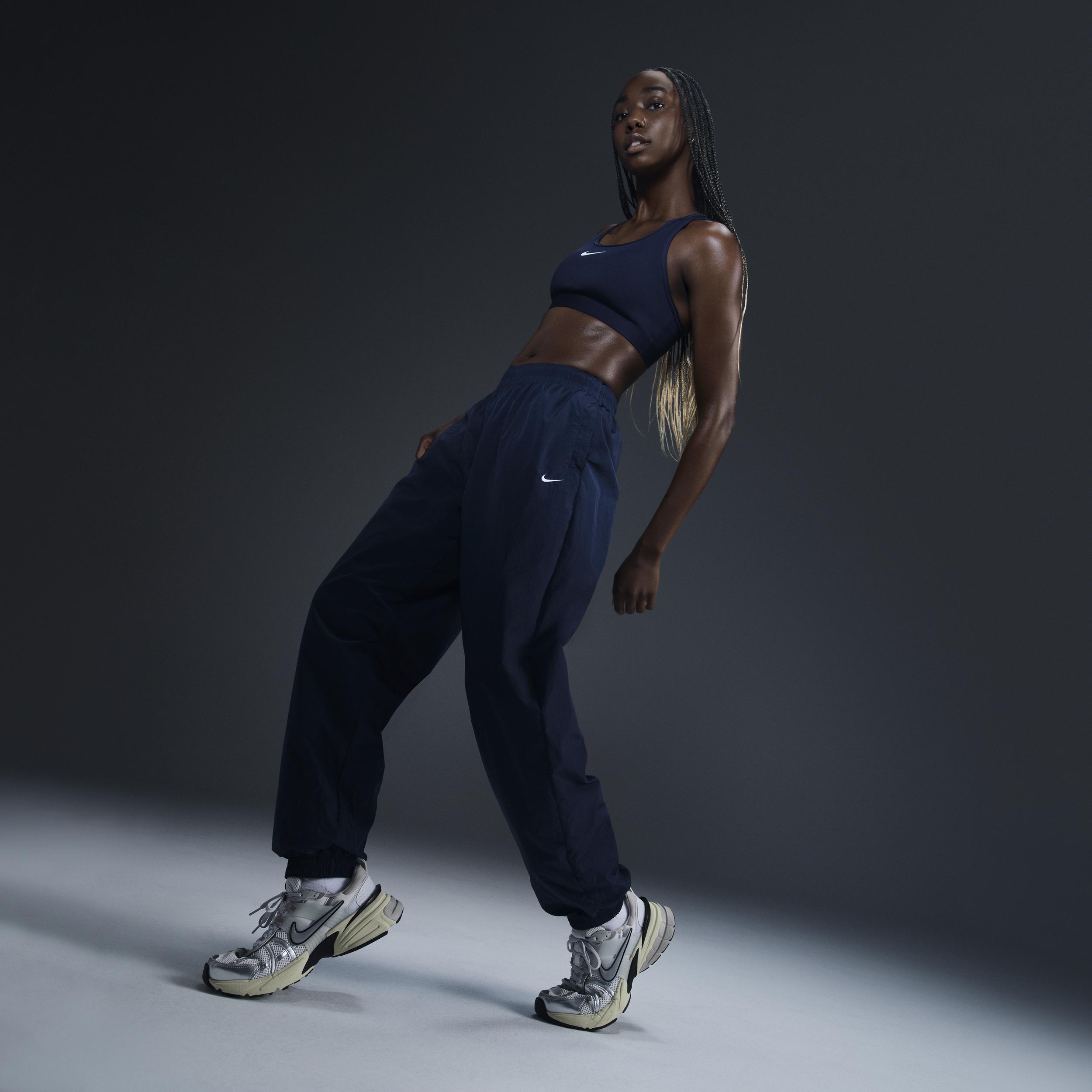 Womens Nike Sportswear Essential Mid-Rise Oversized Woven Jogger Pants Product Image