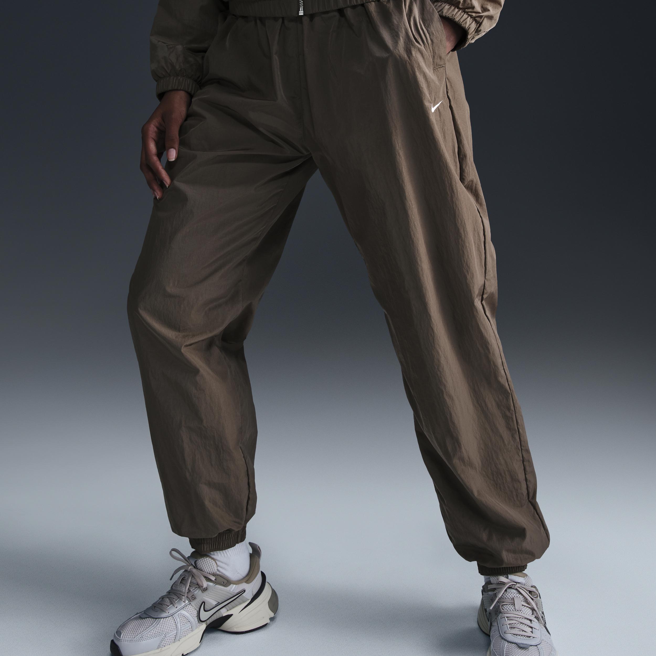 Women's Nike Sportswear Essential Mid-Rise Oversized Woven Jogger Pants Product Image