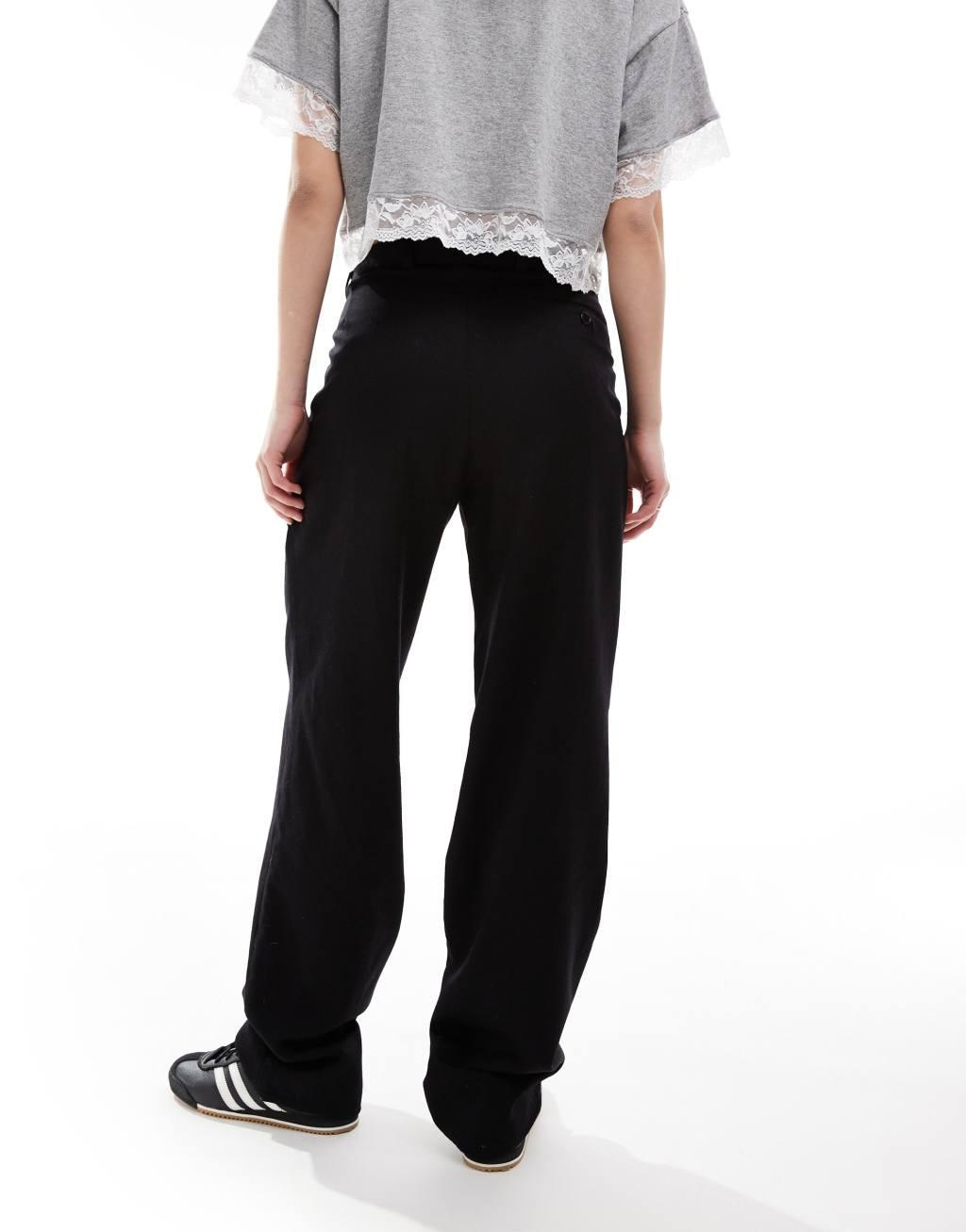 Reclaimed Vintage Revived x Glass Onion slouchy dad pants in black Product Image