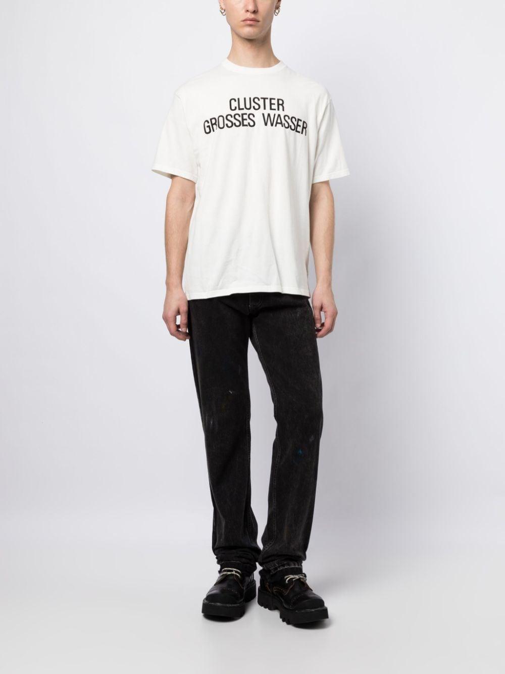 UNDERCOVER Slogan-print Cotton T-shirt In White Product Image