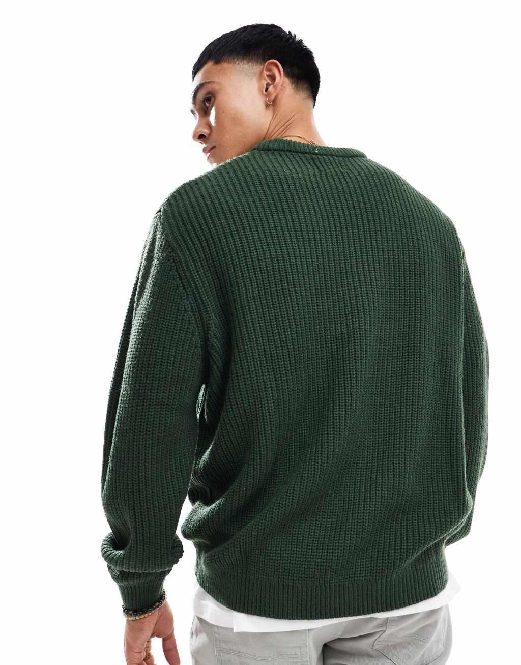 ASOS DESIGN oversized knitted fisherman rib sweater in dark green Product Image