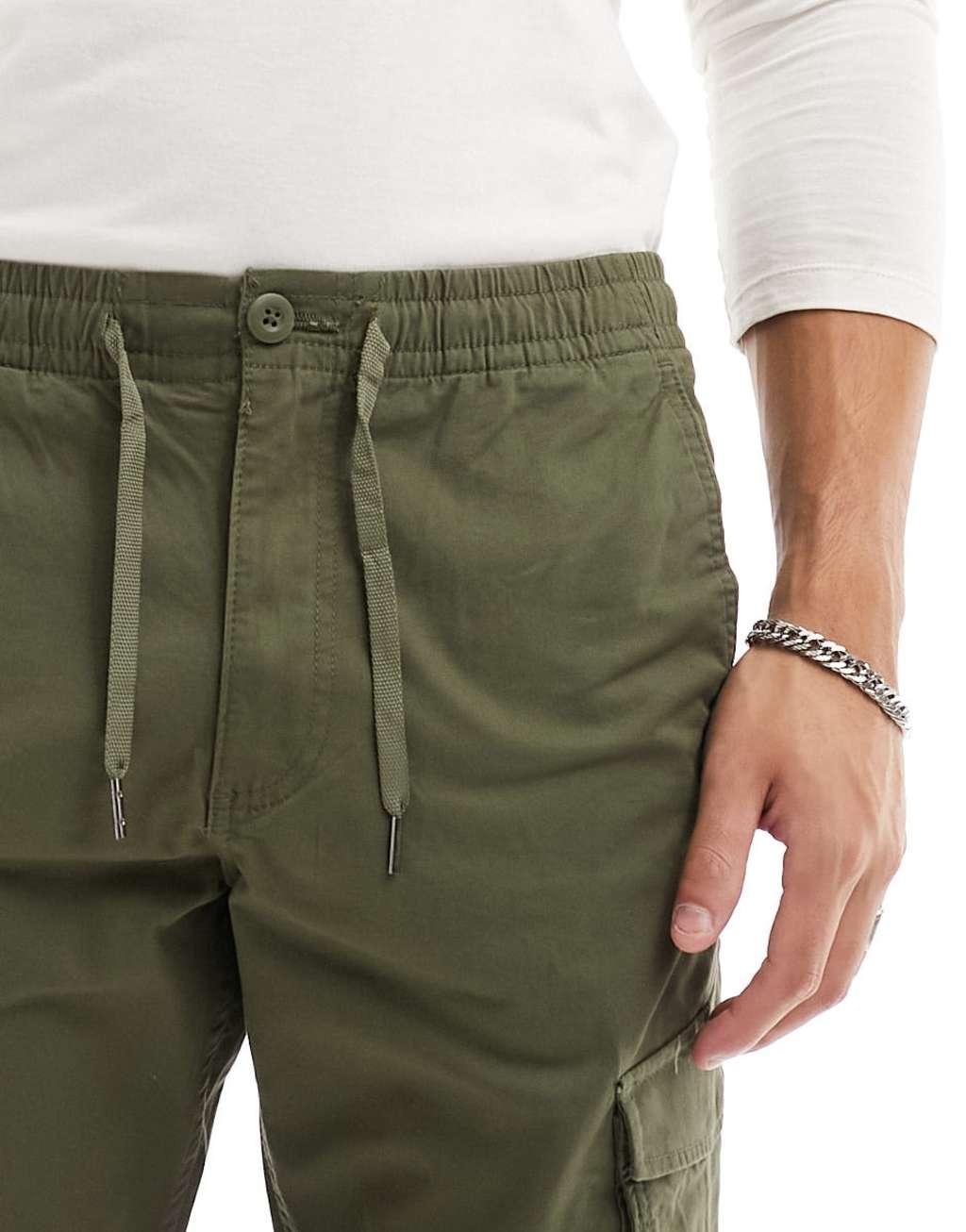 Jack & Jones tapered cuffed cargo in dark green Product Image