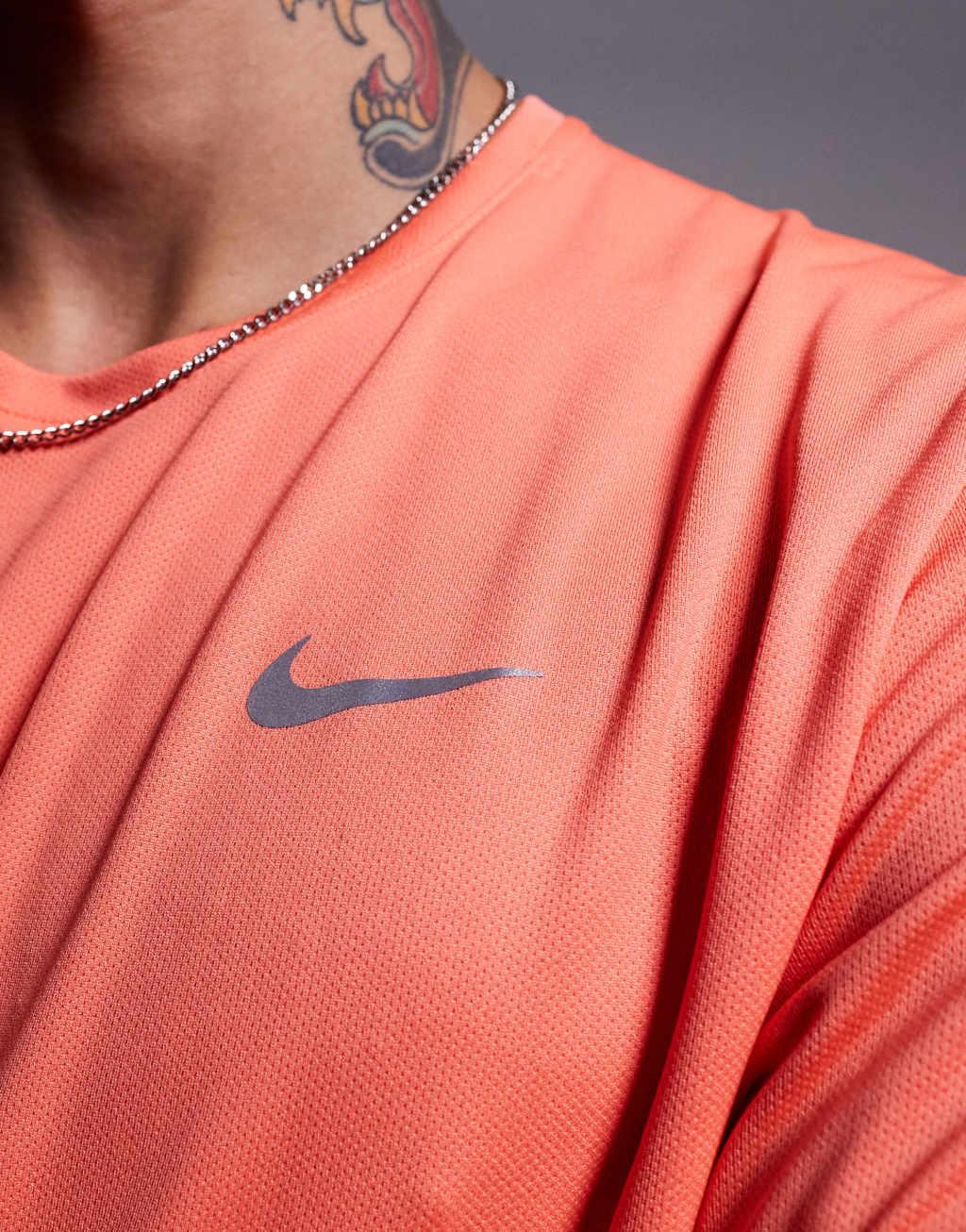 Nike Running Miler Dri-FIT t-shirt in orange Product Image