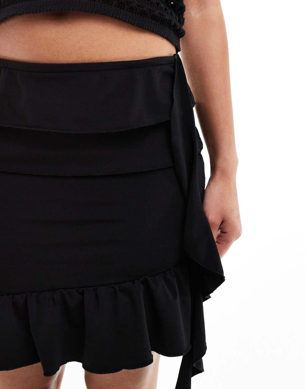 Pieces Festival frill detail mini skirt in black Product Image